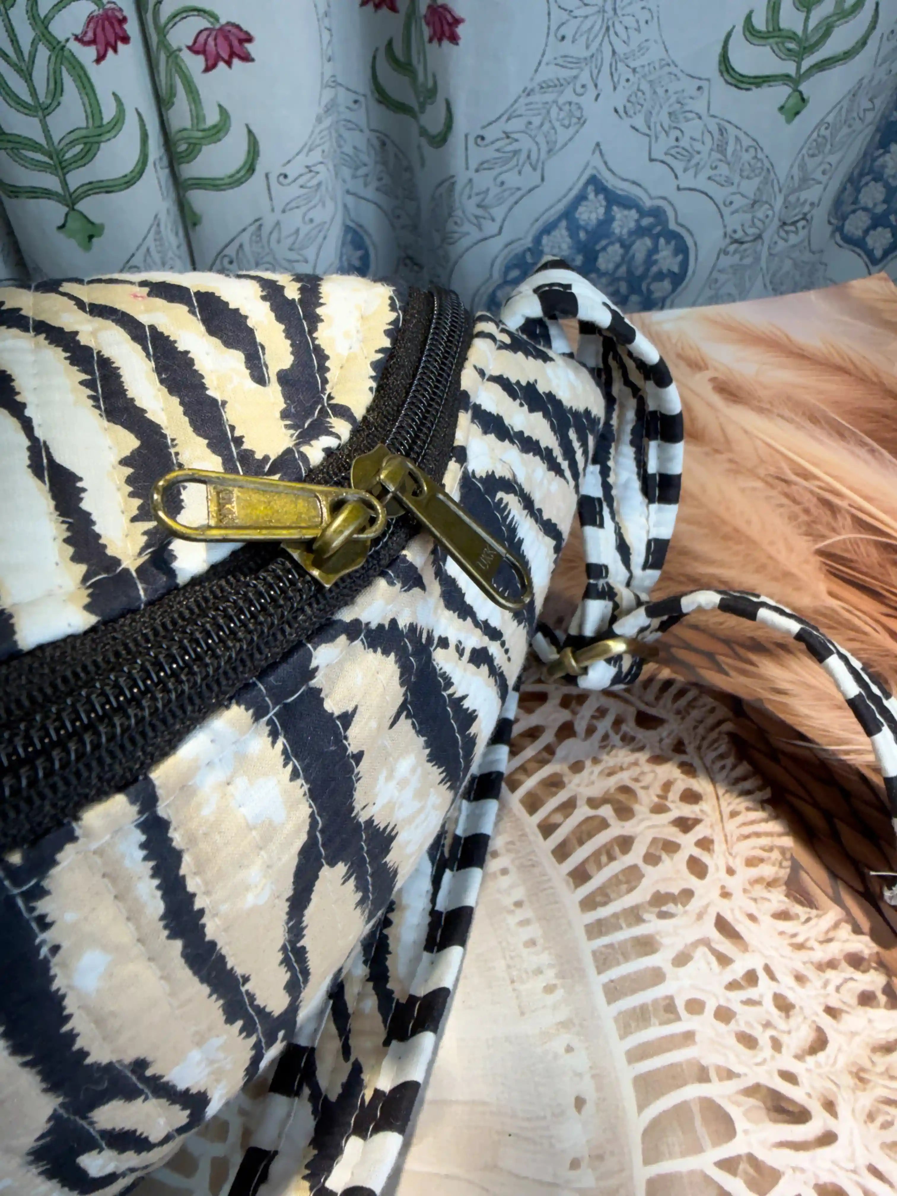 Black and Cream Animal stripe quilted cotton fanny bag with hand block pattern, animal print waist bag for everyday hands-free carry