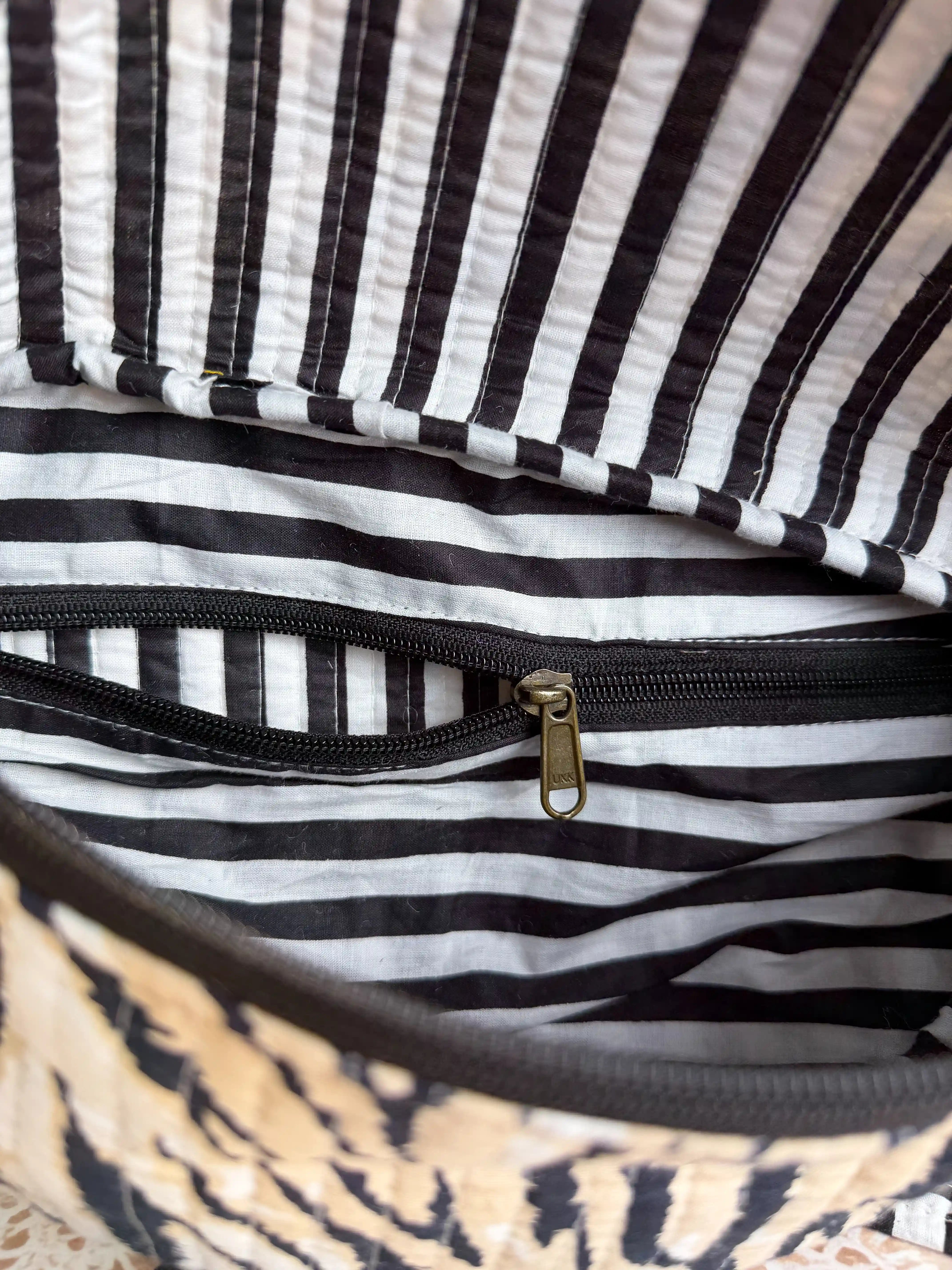 Black and Cream Animal stripe quilted cotton fanny bag with hand block pattern, animal print waist bag for everyday hands-free carry
