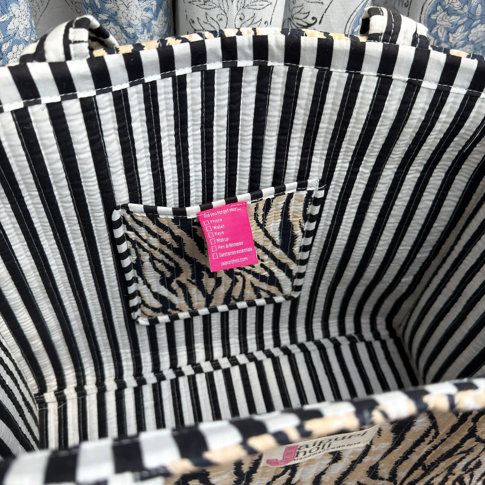 Black and white tiger stripe quilted cotton open mini tote with hand block print, striking animal print mini bag for everyday carry.