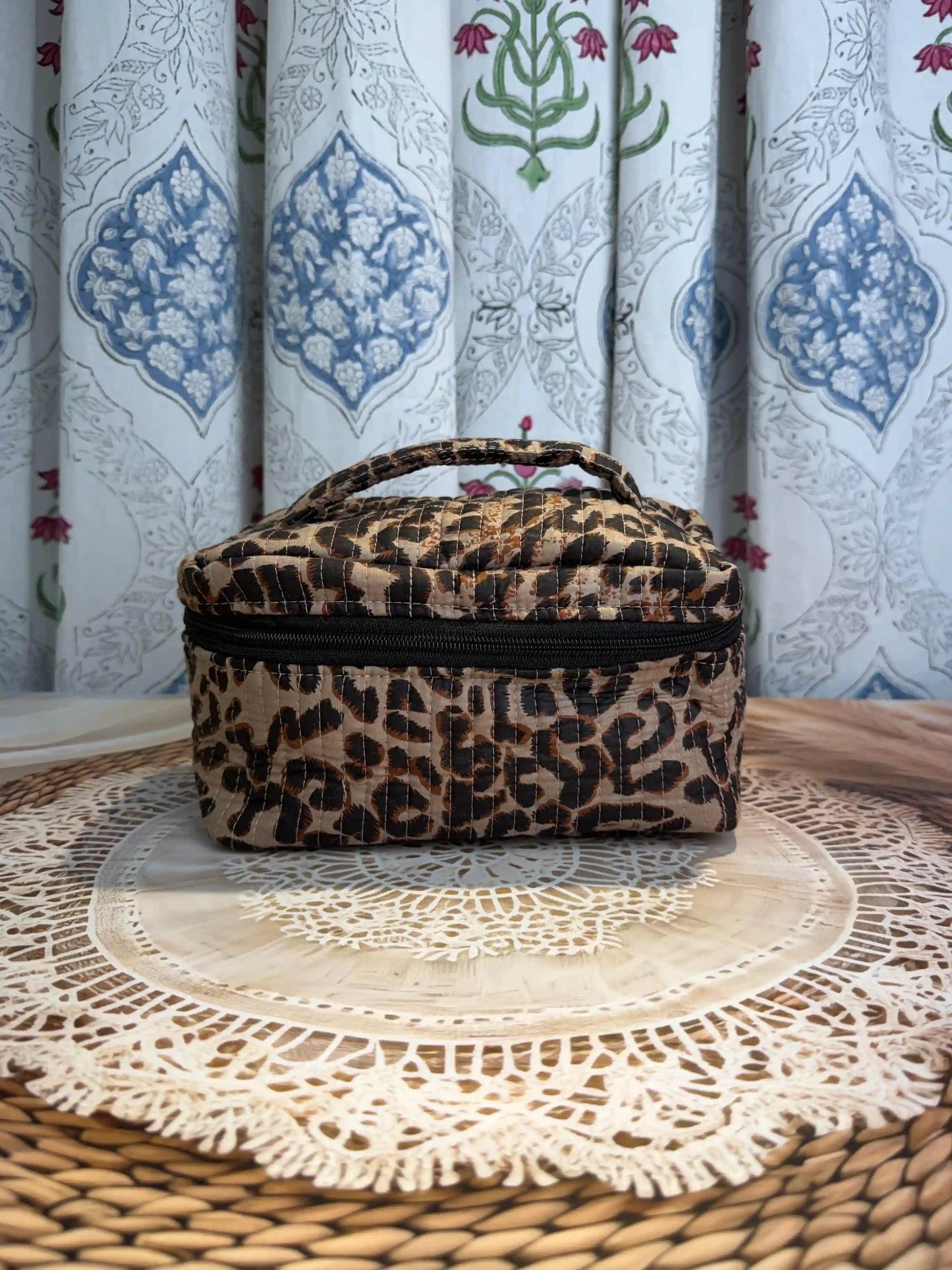 Brown quilted cotton cosmetic vanity bag with leopard print hand block pattern, animal print makeup organizer for travel and daily use
