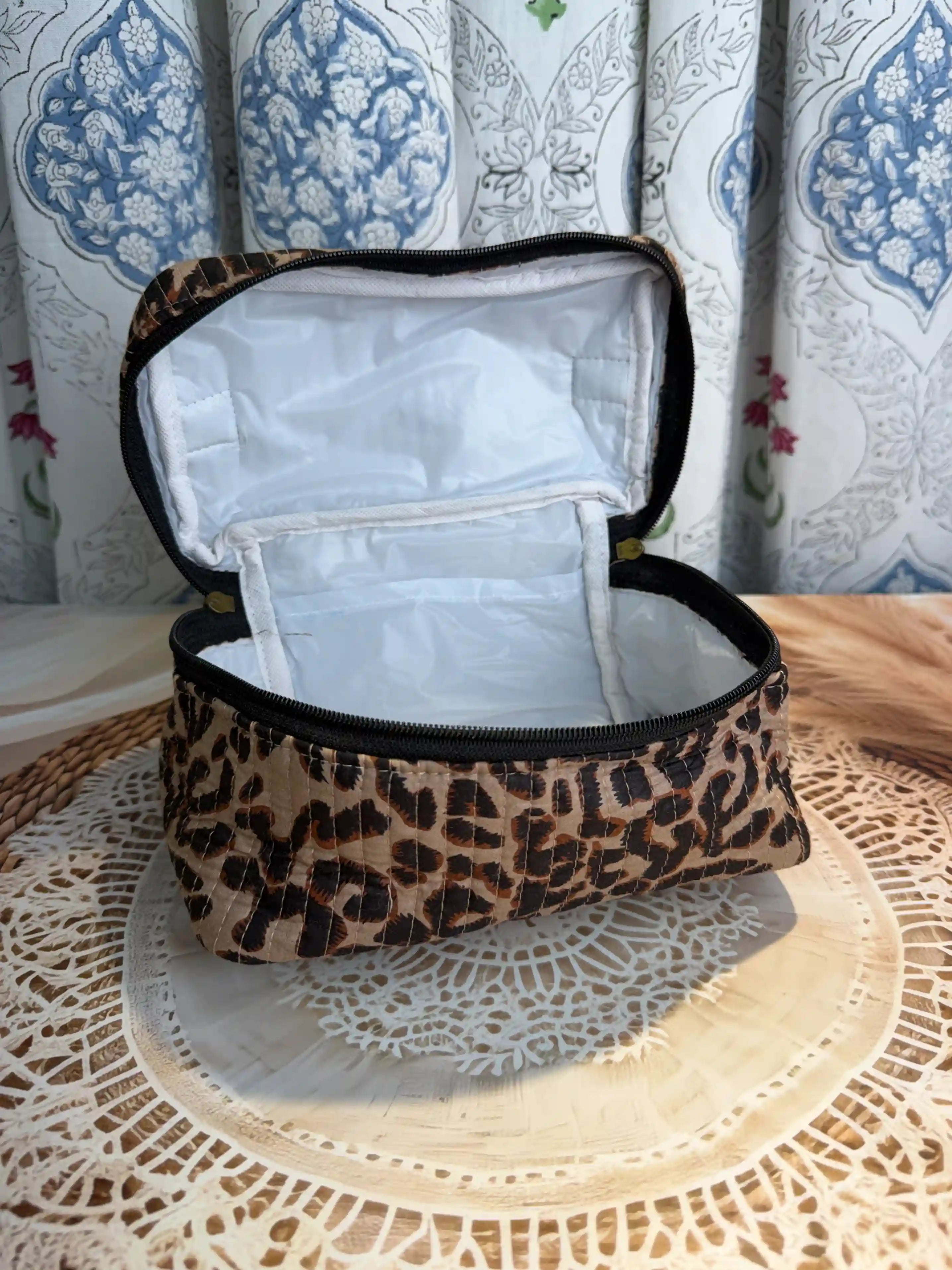 Brown quilted cotton cosmetic vanity bag with leopard print hand block pattern, animal print makeup organizer for travel and daily use