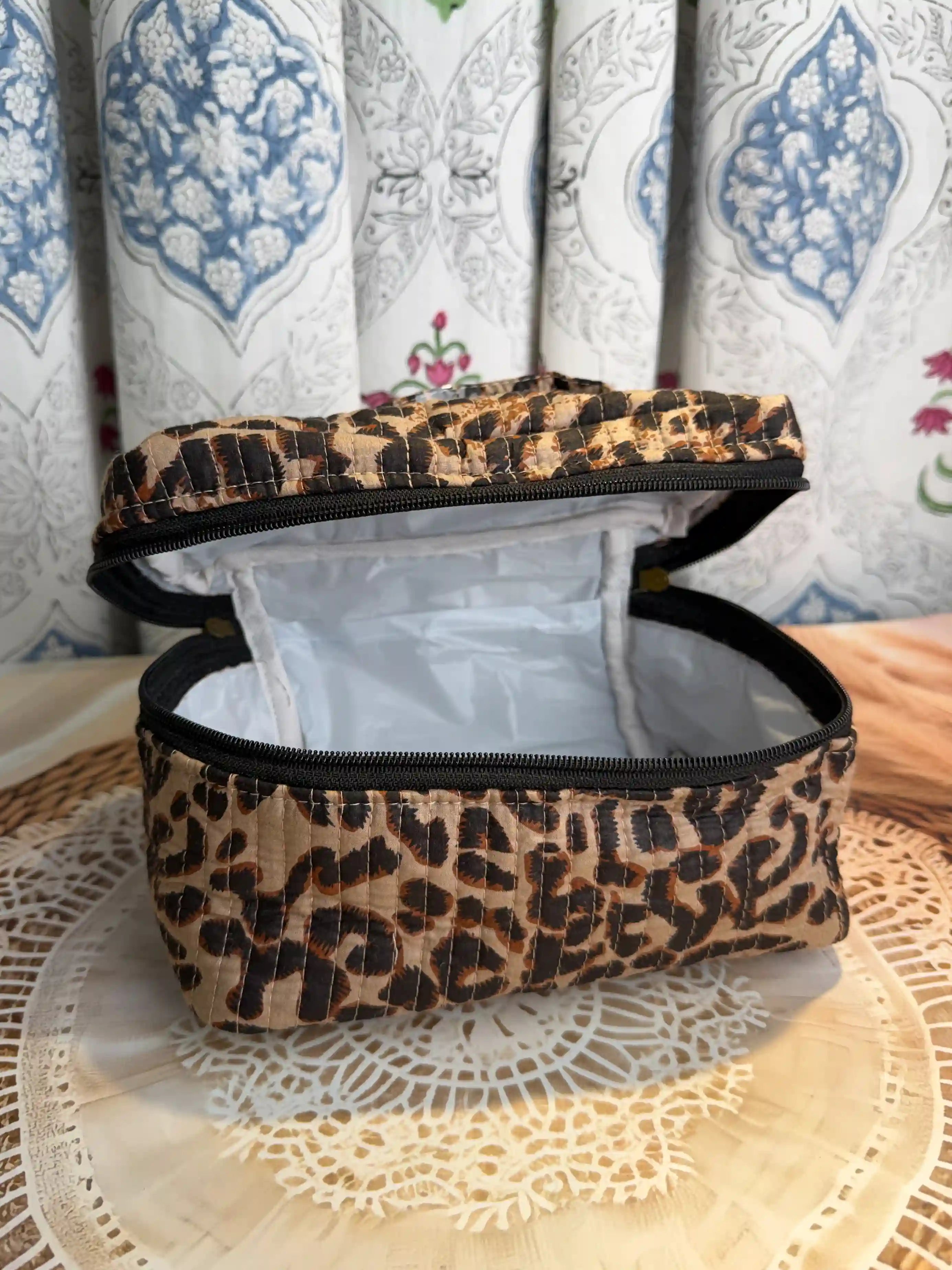 Brown quilted cotton cosmetic vanity bag with leopard print hand block pattern, animal print makeup organizer for travel and daily use