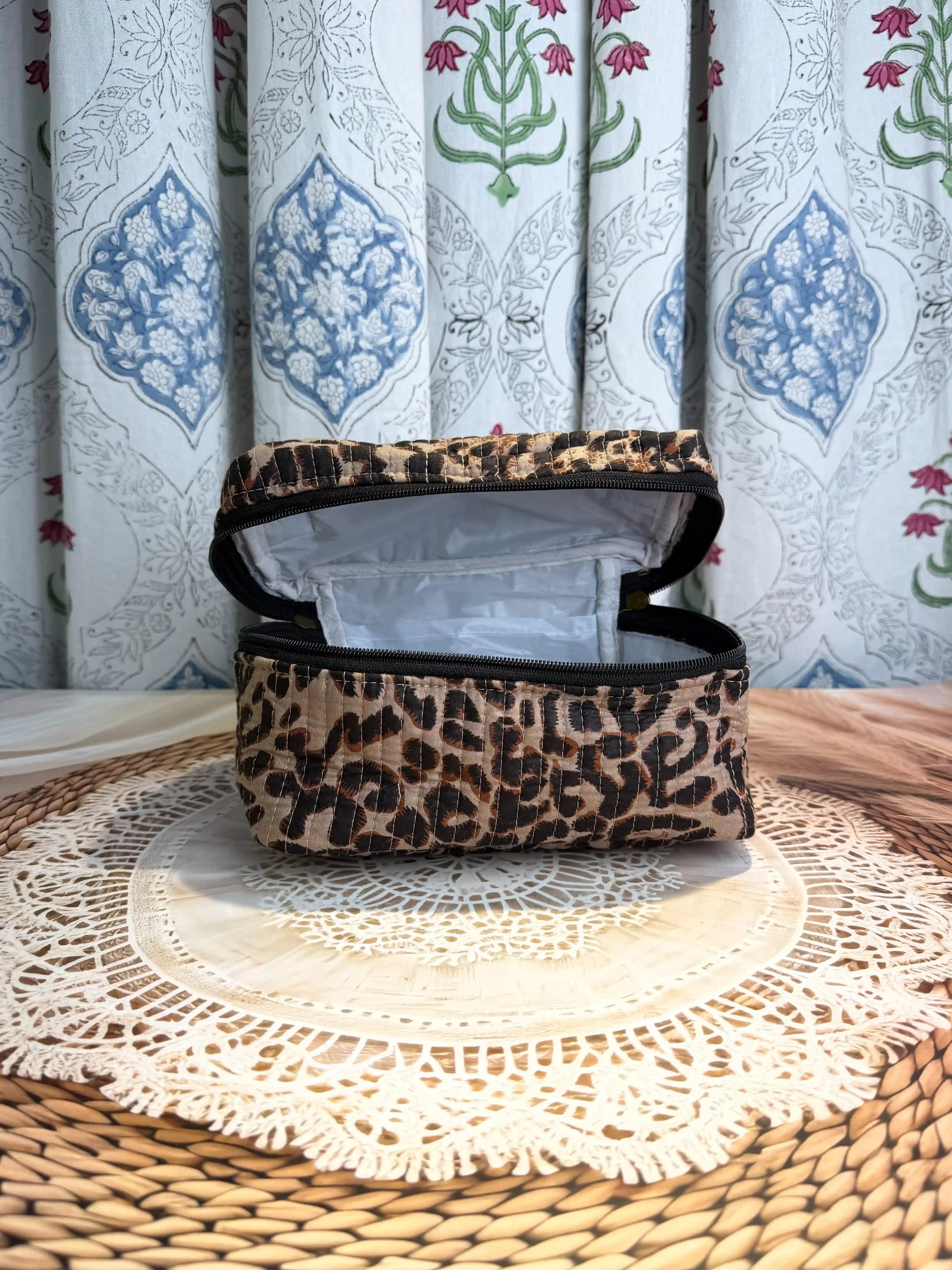 Brown quilted cotton cosmetic vanity bag with leopard print hand block pattern, animal print makeup organizer for travel and daily use
