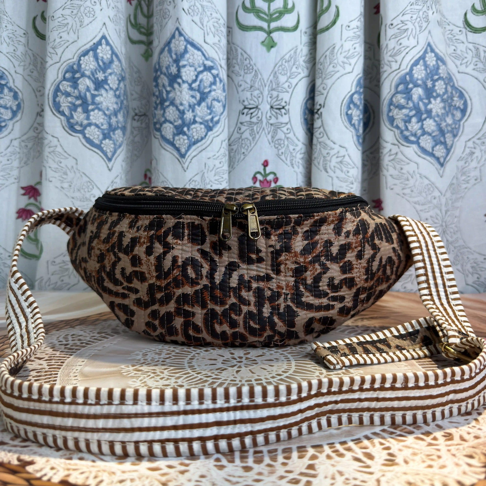 Brown quilted cotton fanny bag hand block design, animal print waist bag with black strap for everyday use.
