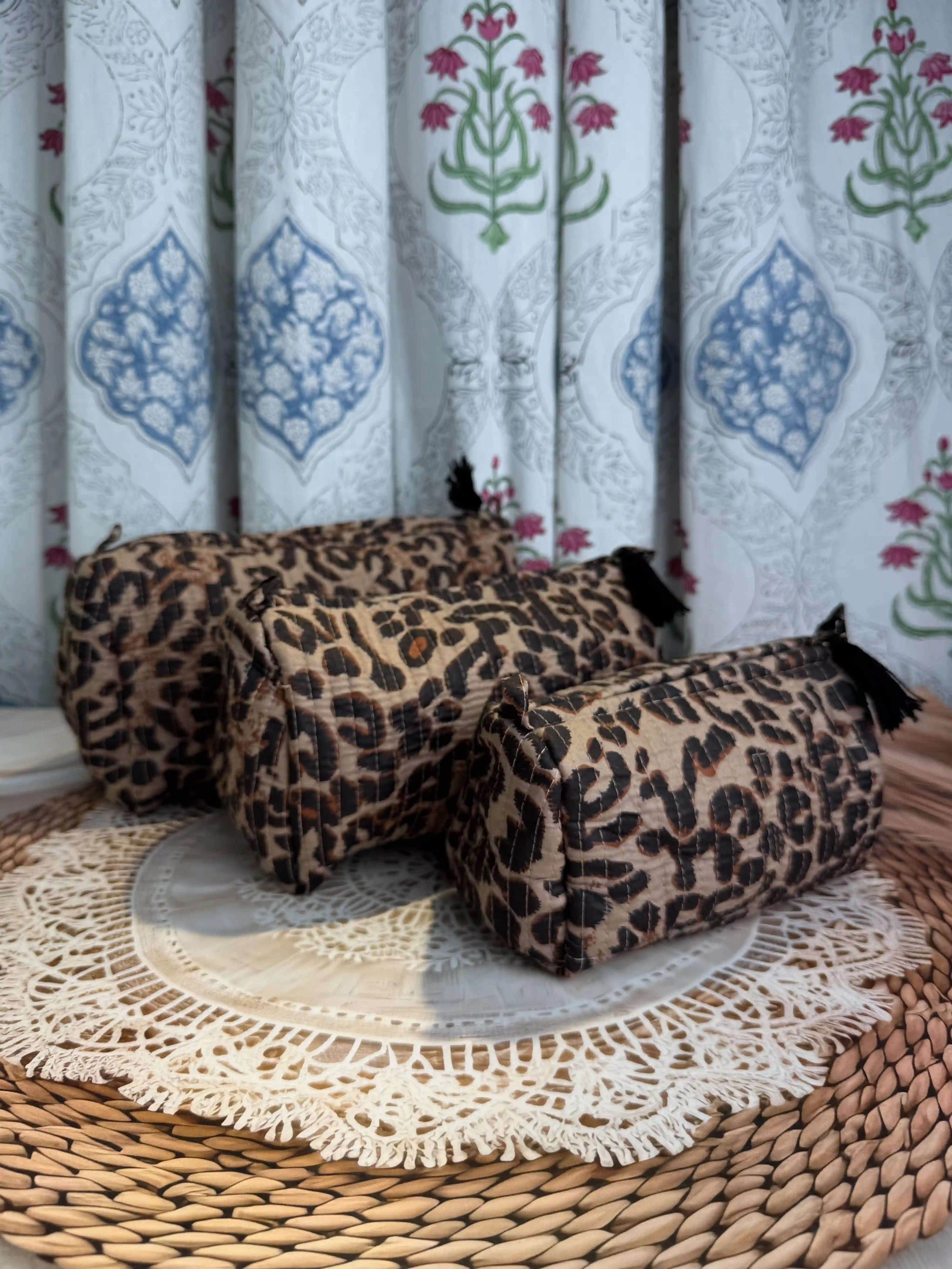 Brown and black quilted cotton toiletry pouch set with leopard print hand block pattern, animal print three-piece travel organizer for cosmetics and toiletries