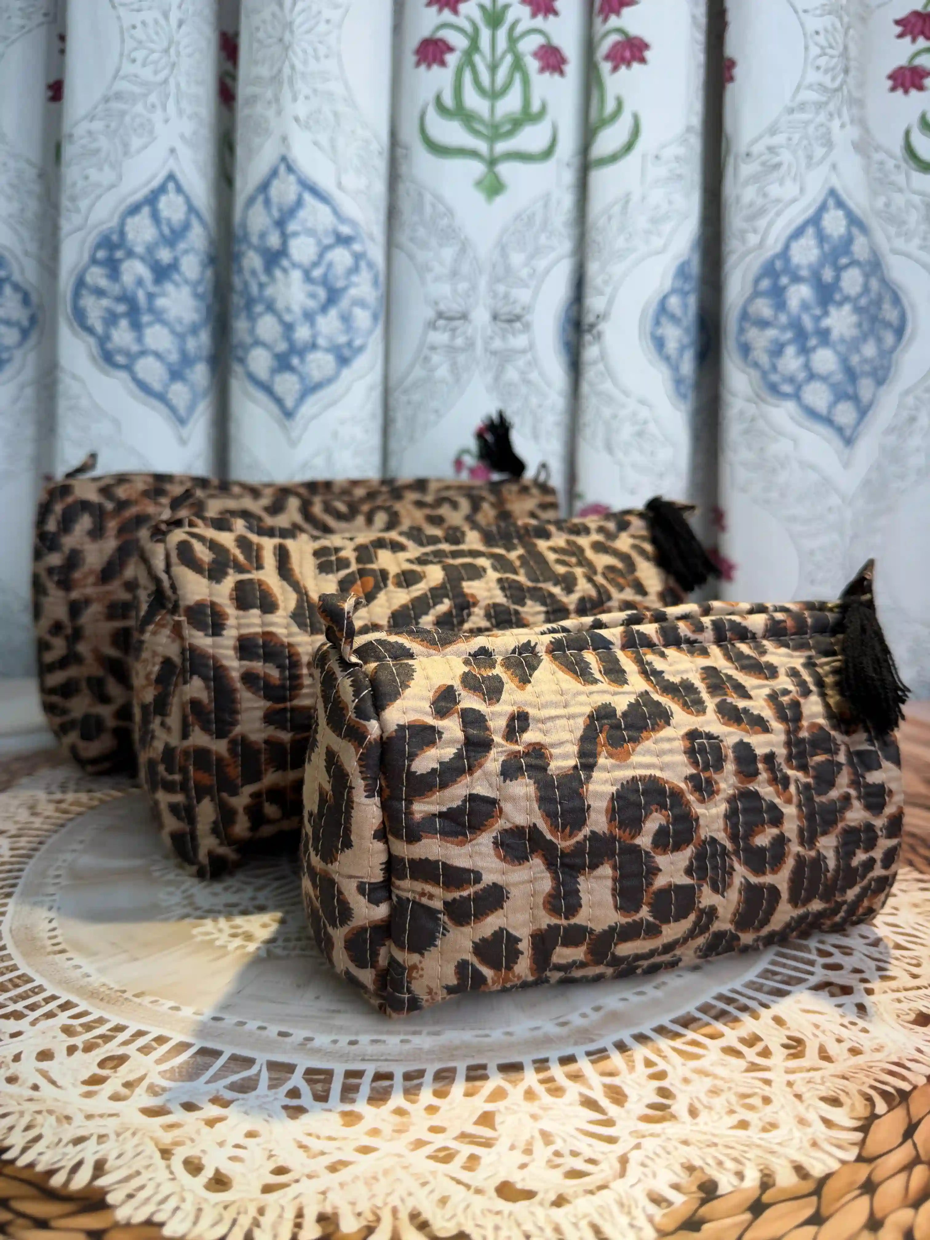 Brown and black quilted cotton toiletry pouch set with leopard print hand block pattern, animal print three-piece travel organizer for cosmetics and toiletries