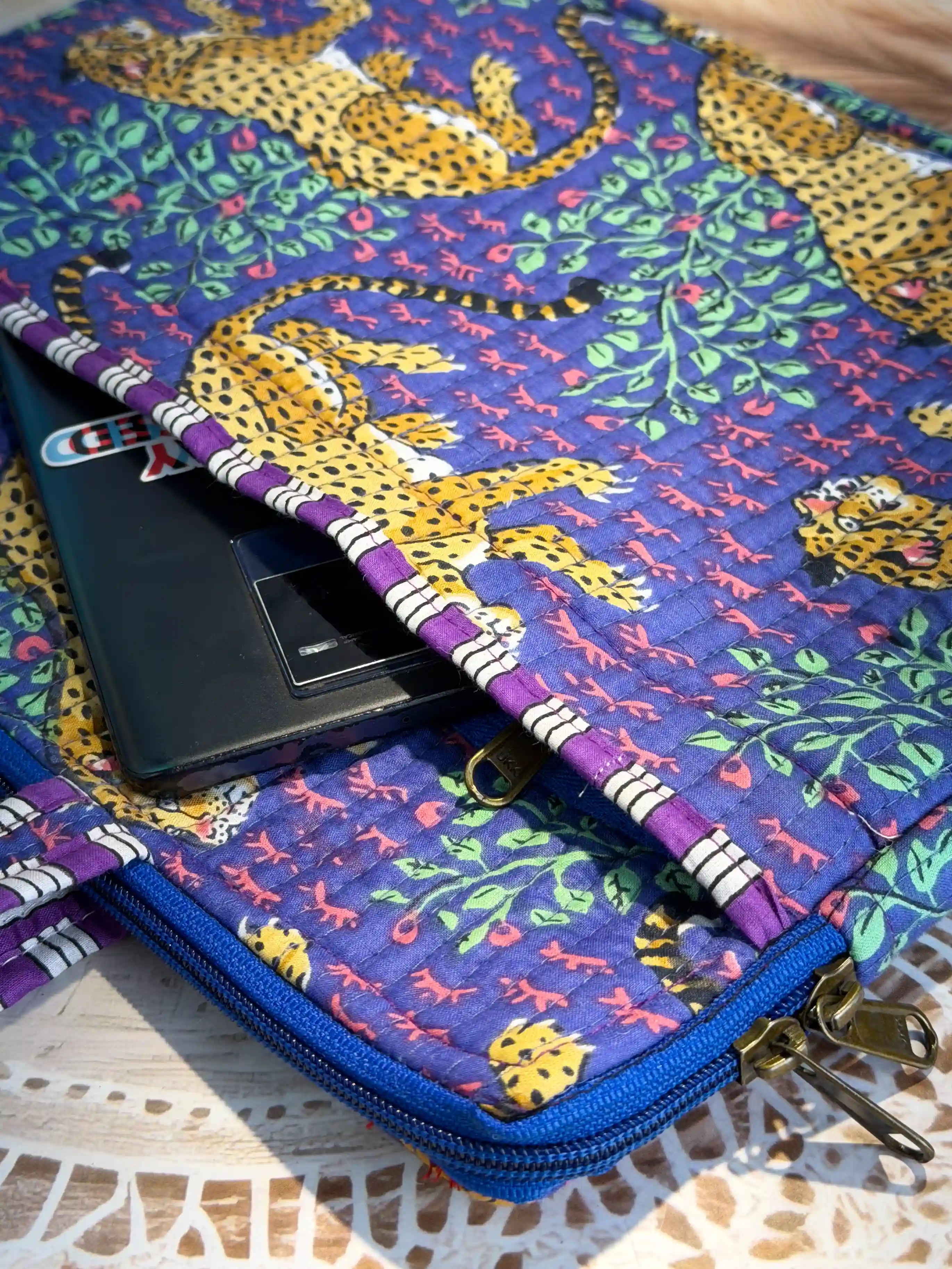 Deep navy quilted cotton laptop bag with yellow elephant print hand block design and purple striped borders, animal print padded laptop sleeve