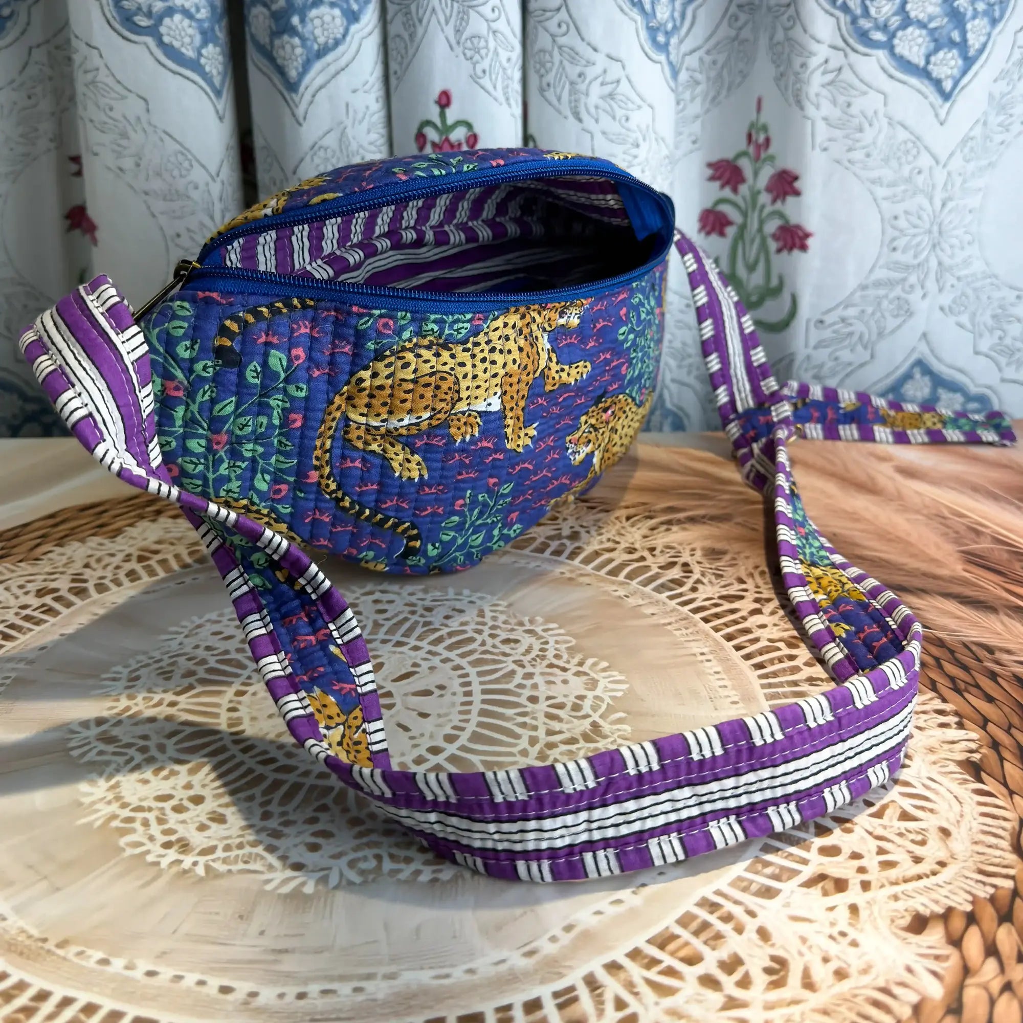 Deep blue quilted cotton fanny bag with yellow print hand block design, purple geometric strap for hands-free daily wear