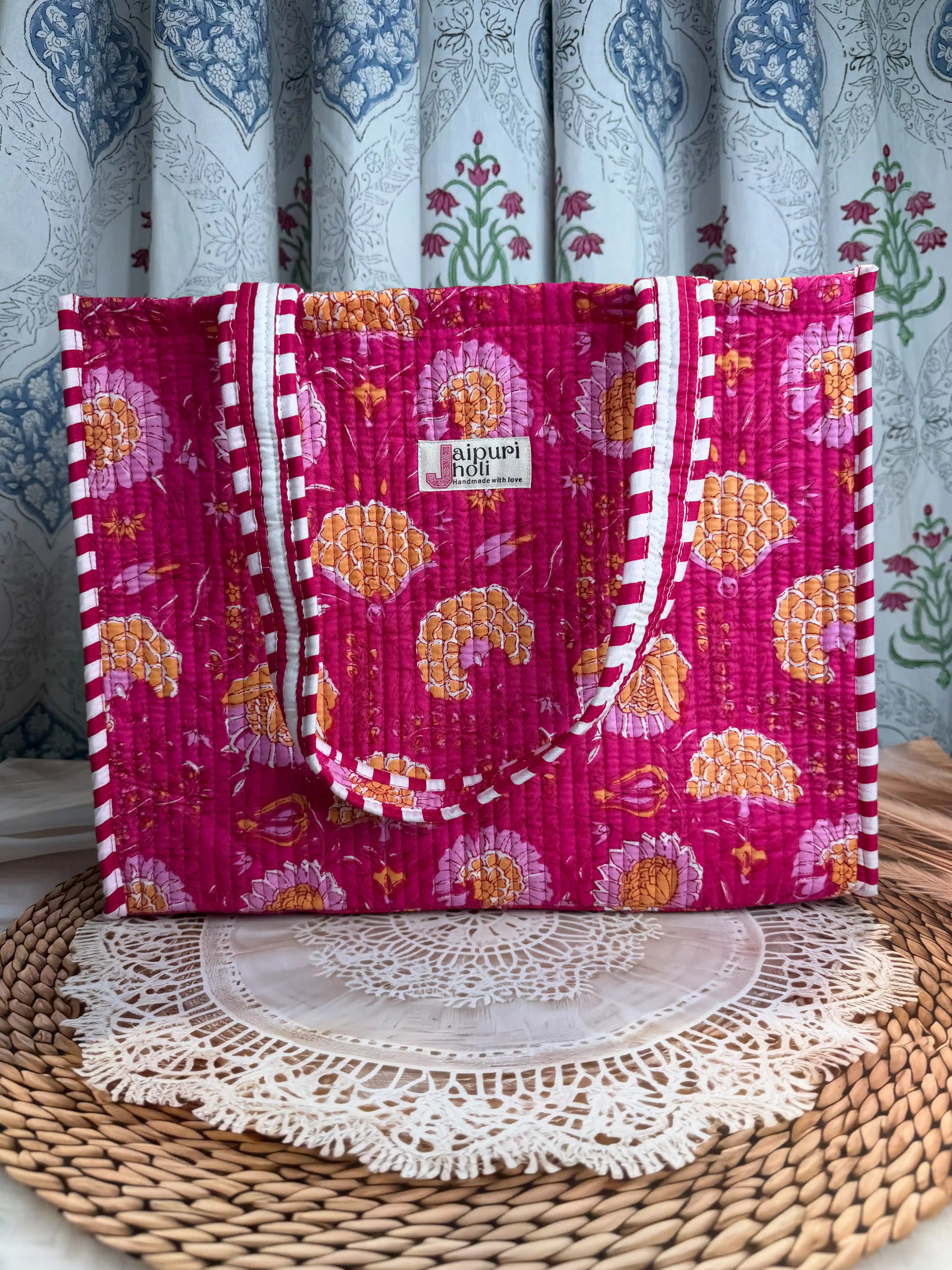 Pink quilted cotton tote bag with traditional hand block print design and zip closure, everyday shoulder bag for daily use and travel.