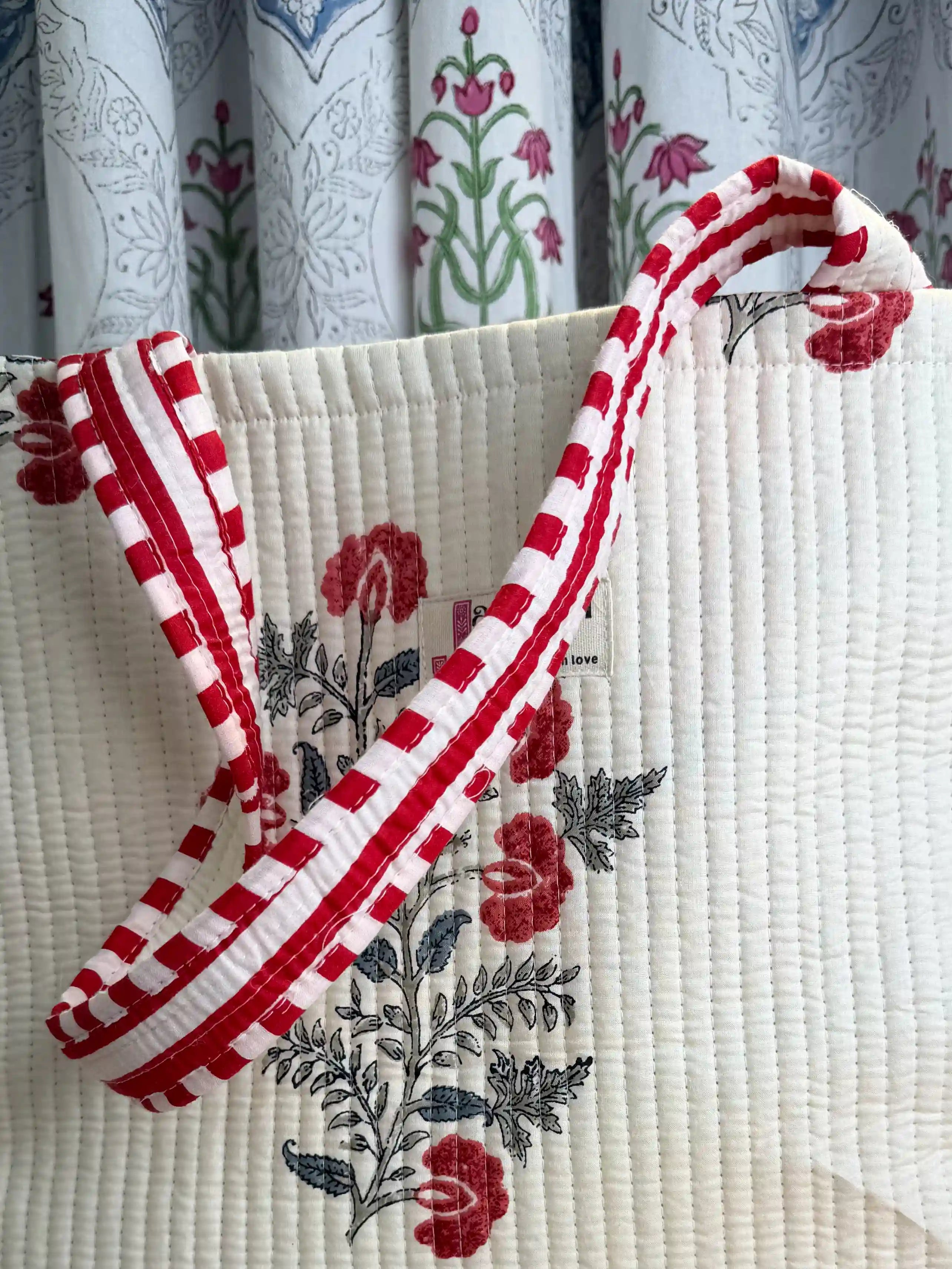 White quilted cotton open mini tote with red floral hand block print and red and white striped borders, premium mini shoulder bag for daily use.