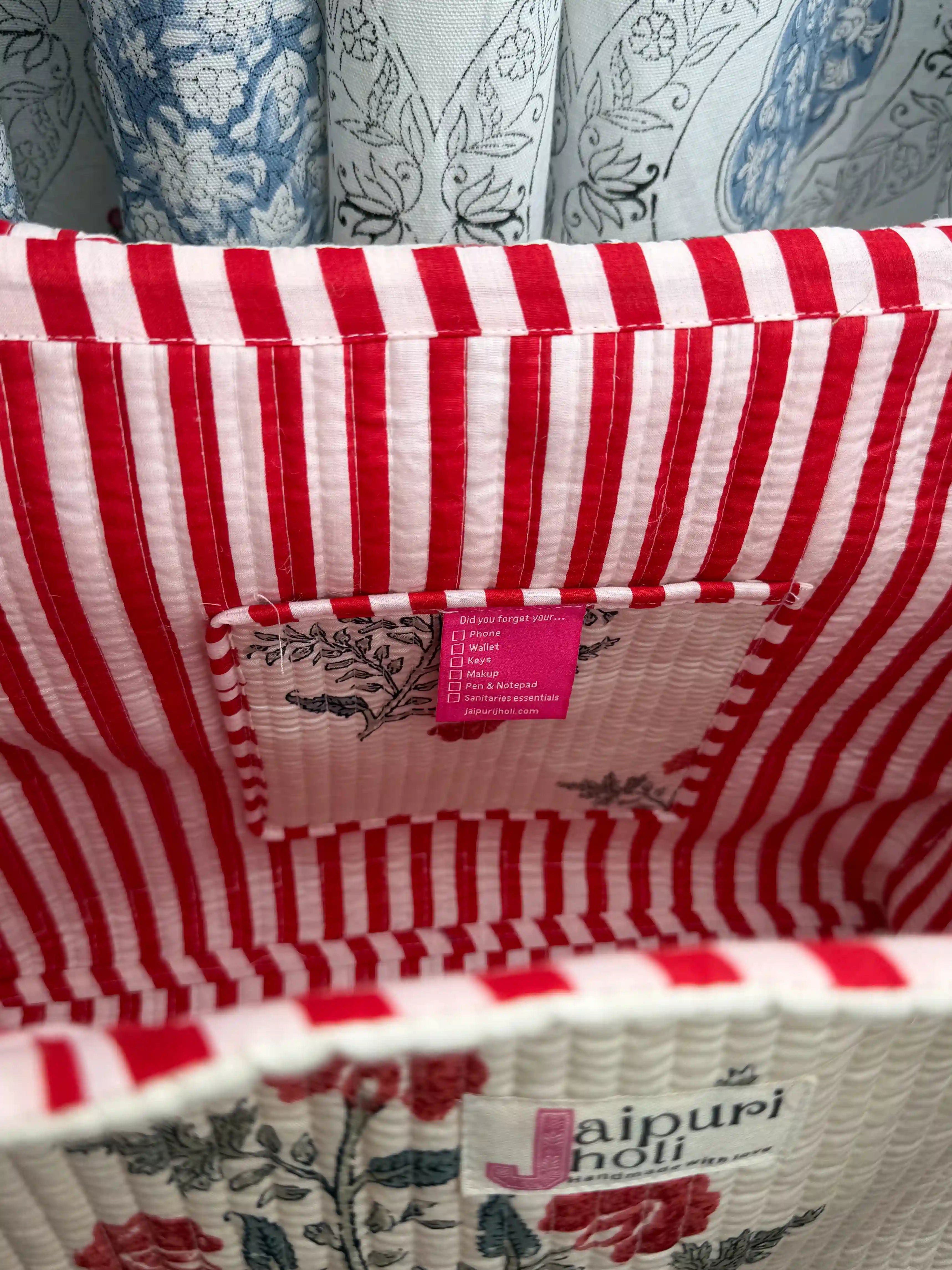 White quilted cotton open mini tote with red floral hand block print and red and white striped borders, premium mini shoulder bag for daily use.