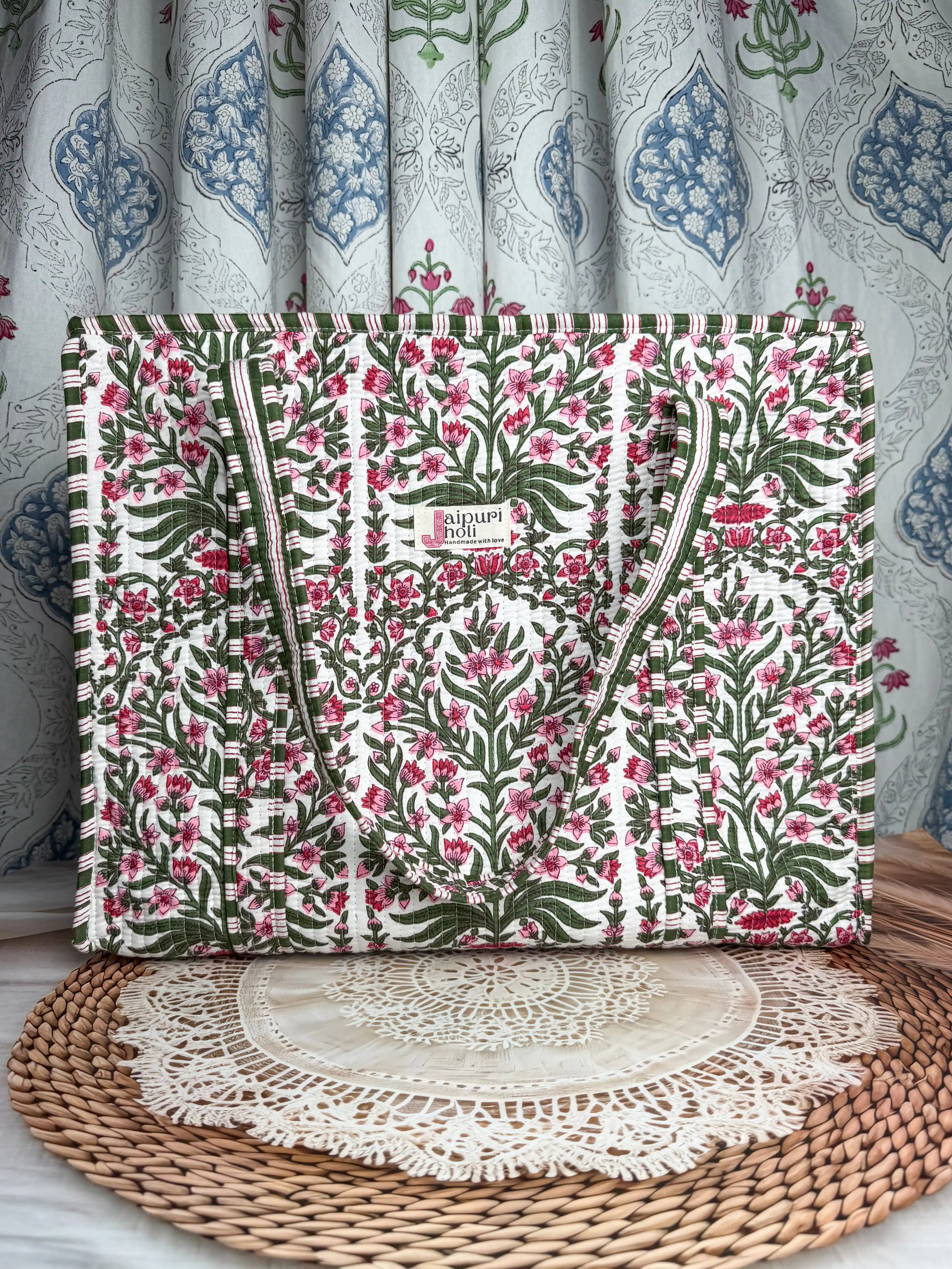 White quilted cotton tote bag with pink floral hand block design and zip, lightweight everyday shoulder bag for daily use.