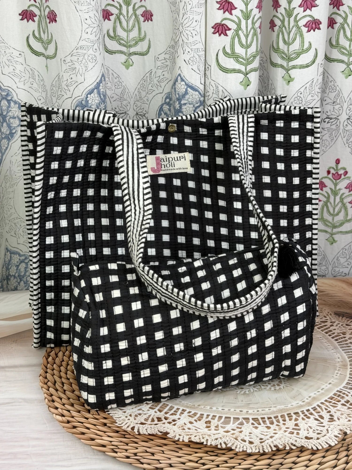 Jaipur block print cotton quilted button tote bag with matching pouch, black and white geometric check print, 15×12×6 inch tote with 10×6 inch pouch for organizing toiletries, cosmetics and medicines side view