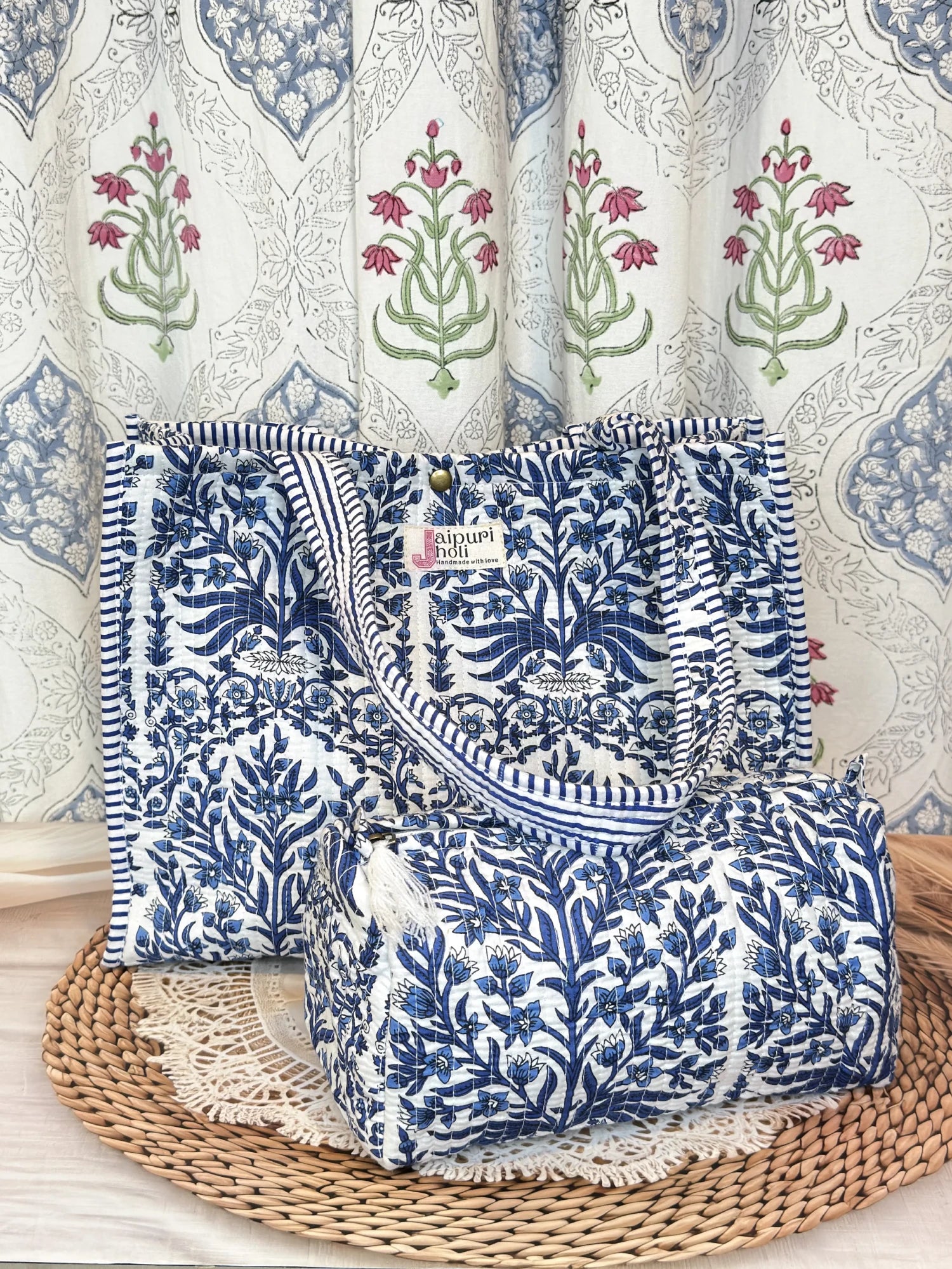 Jaipur block print cotton quilted button tote bag with matching pouch, blue floral and leaf print, 15×12×6 inch tote with 10×6 inch pouch for organizing toiletries, cosmetics and medicines front view