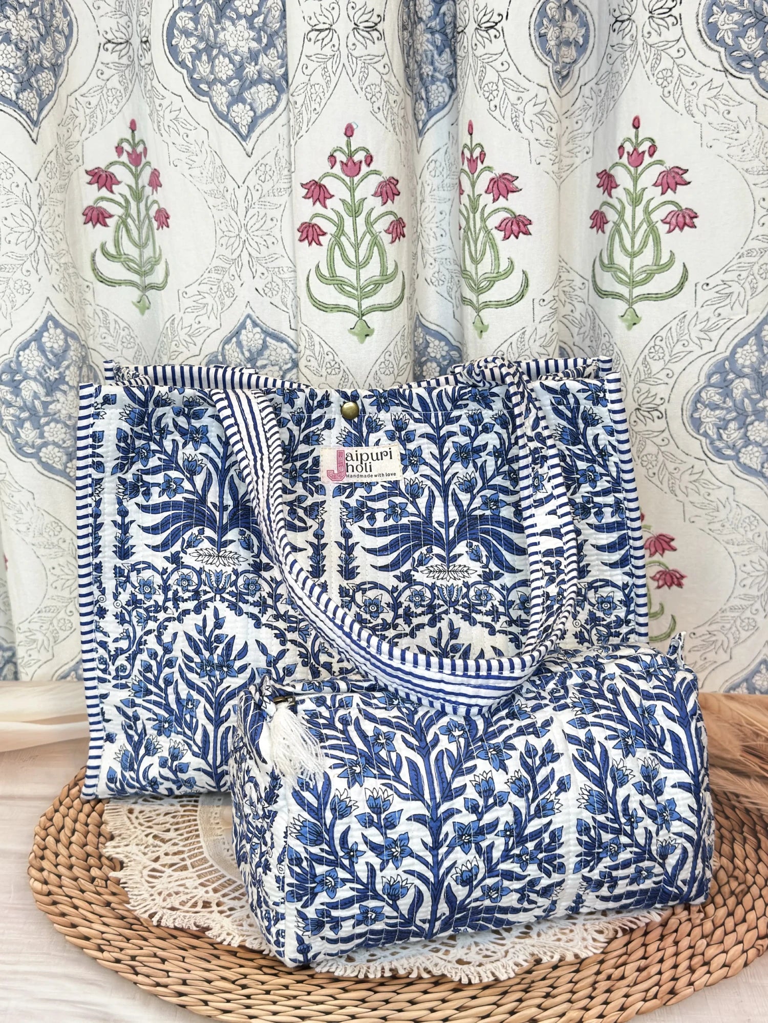 Jaipur block print cotton quilted button tote bag with matching pouch, blue floral and leaf print, 15×12×6 inch tote with 10×6 inch pouch for organizing toiletries, cosmetics and medicines side view