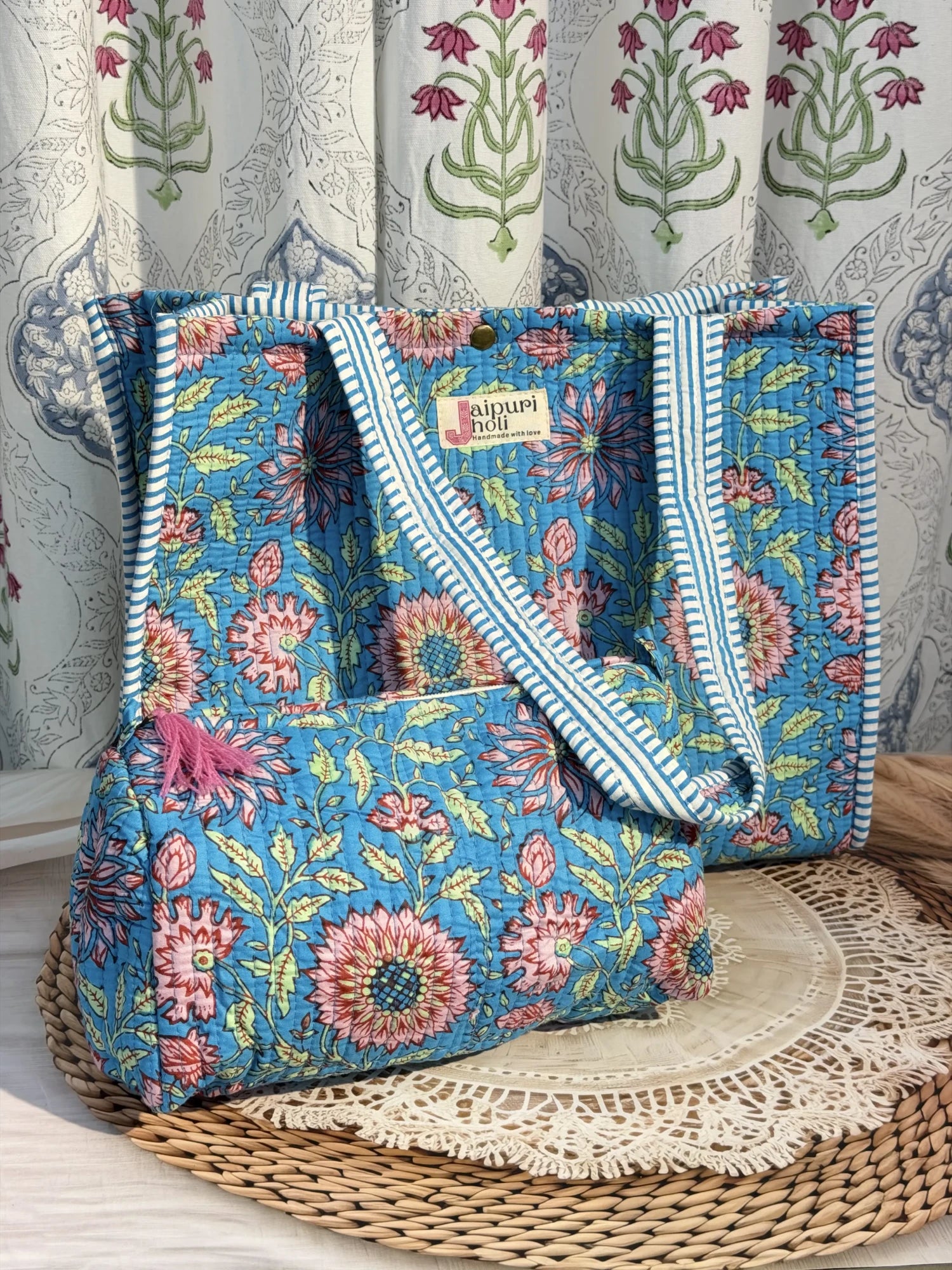 Jaipur block print cotton quilted button tote bag with matching pouch, blue floral print, 15×12×6 inch tote with 10×6 inch pouch for organizing toiletries, cosmetics and travel essentials front  view