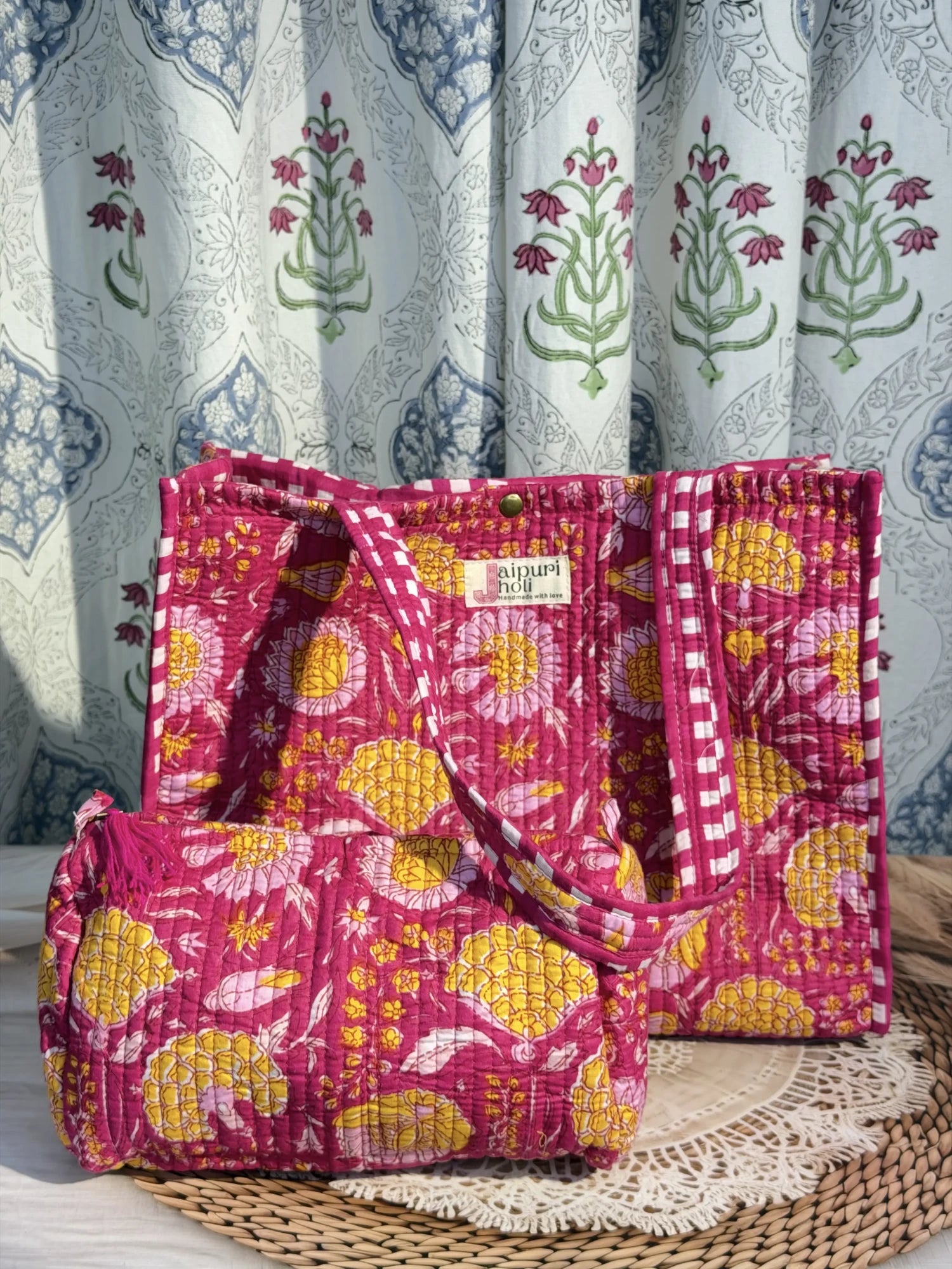 Jaipur block print cotton quilted button tote bag with matching pouch, pink floral print, 15×12×6 inch tote with 10×6 inch pouch for storing toiletries, cosmetics and medicines side view