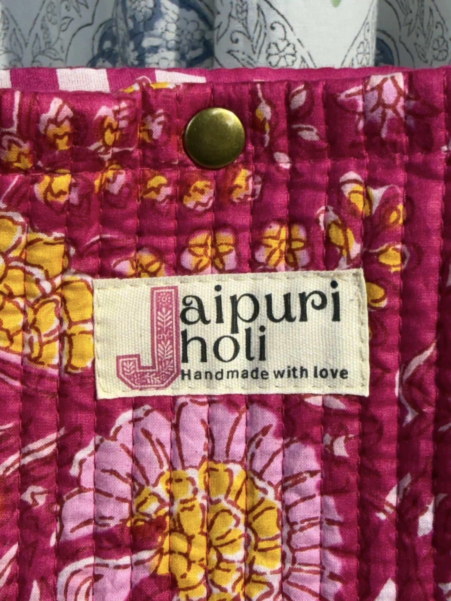 Jaipur block print cotton quilted button tote bag with matching pouch, pink floral print, 15×12×6 inch tote with 10×6 inch pouch for storing toiletries, cosmetics and medicines interior view