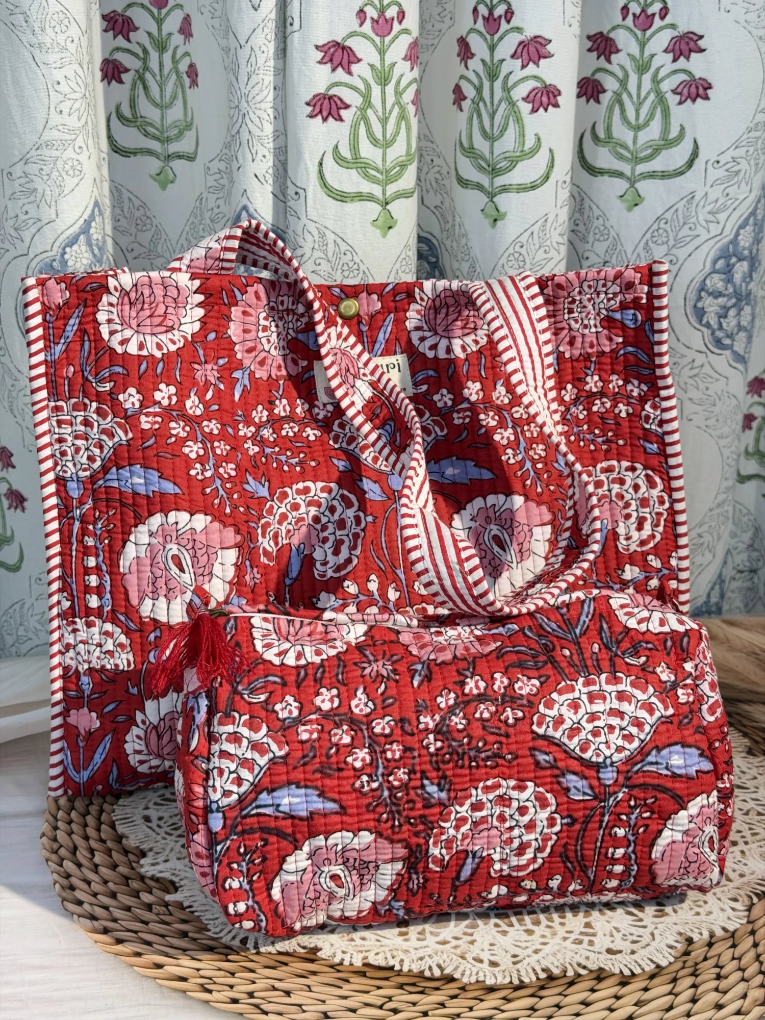 Jaipur block print cotton quilted button tote bag with matching pouch, red floral print, 15×12×6 inch tote with 10×6 inch pouch for keeping toiletries, cosmetics and medicines organized front view