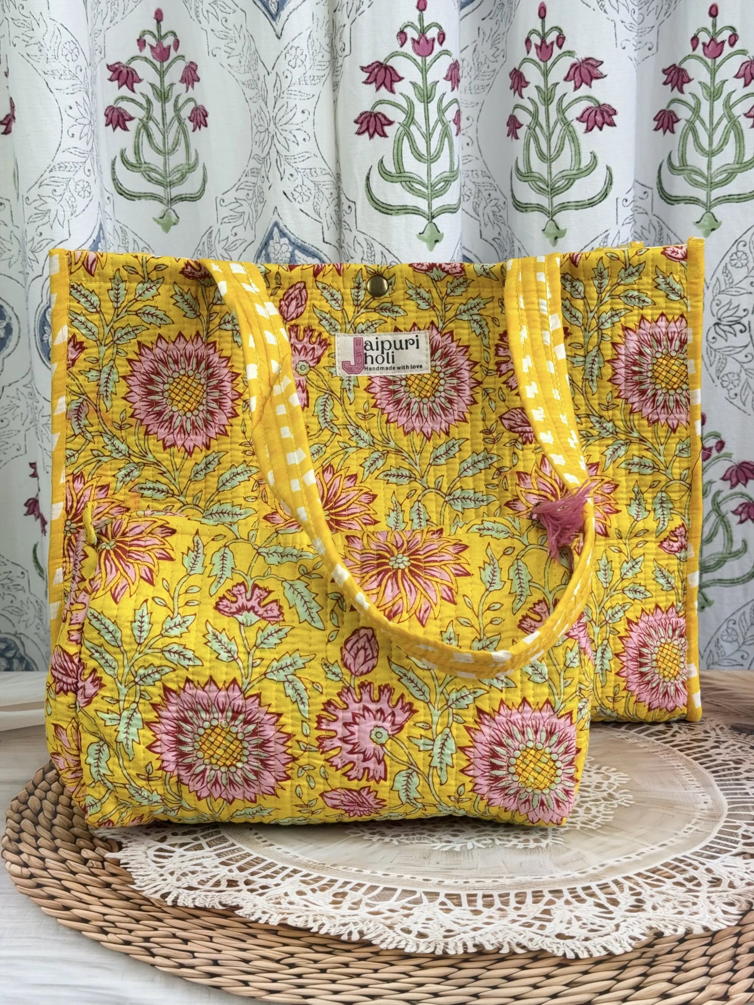 Jaipur block print cotton quilted button tote bag with matching pouch, yellow floral print, 15×12×6 inch tote with 10×6 inch pouch for organizing toiletries, cosmetics and daily essentials front view