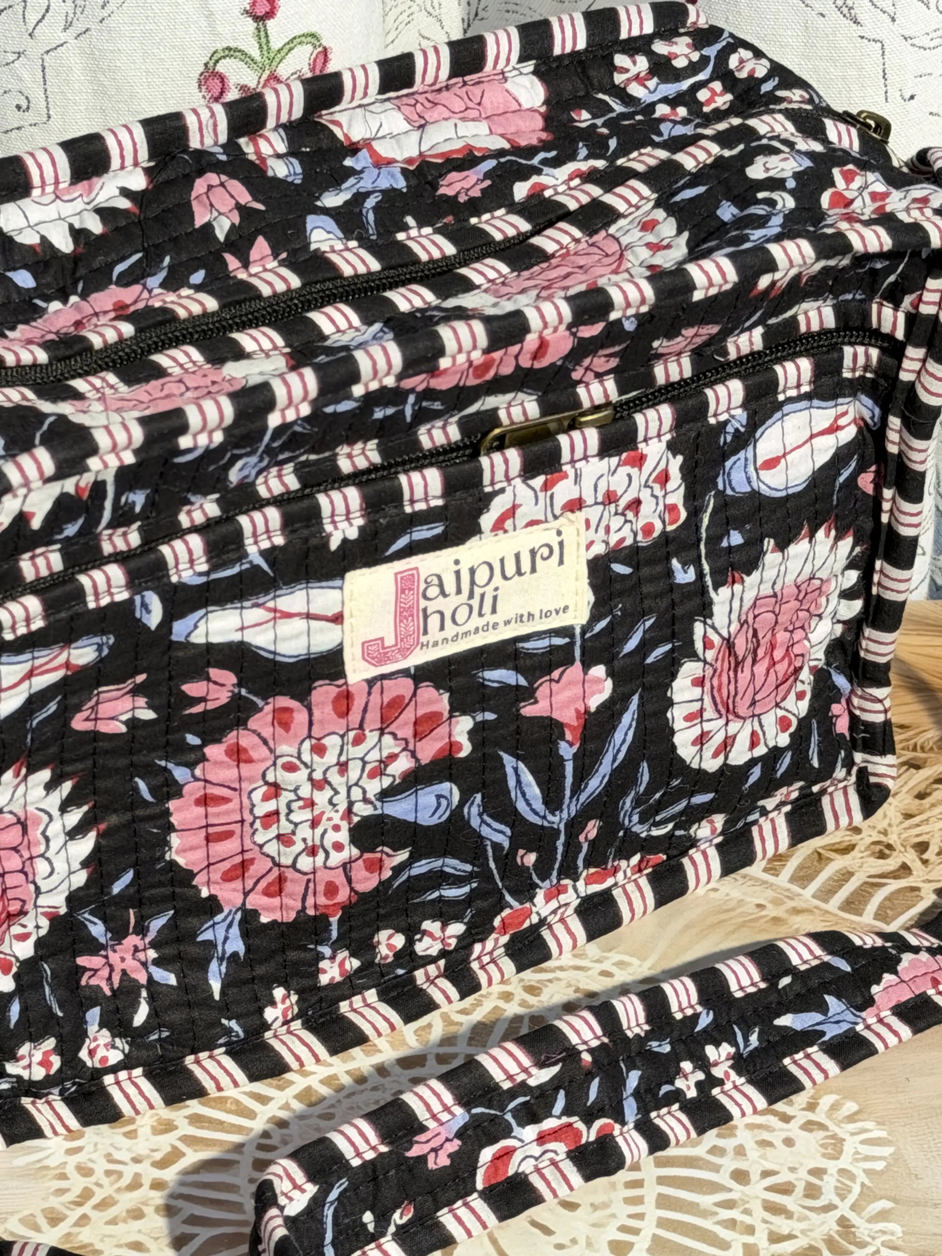 Jaipur Block Print Cotton Quilted Sling Bag - Black and Pink Floral print Close-Up View