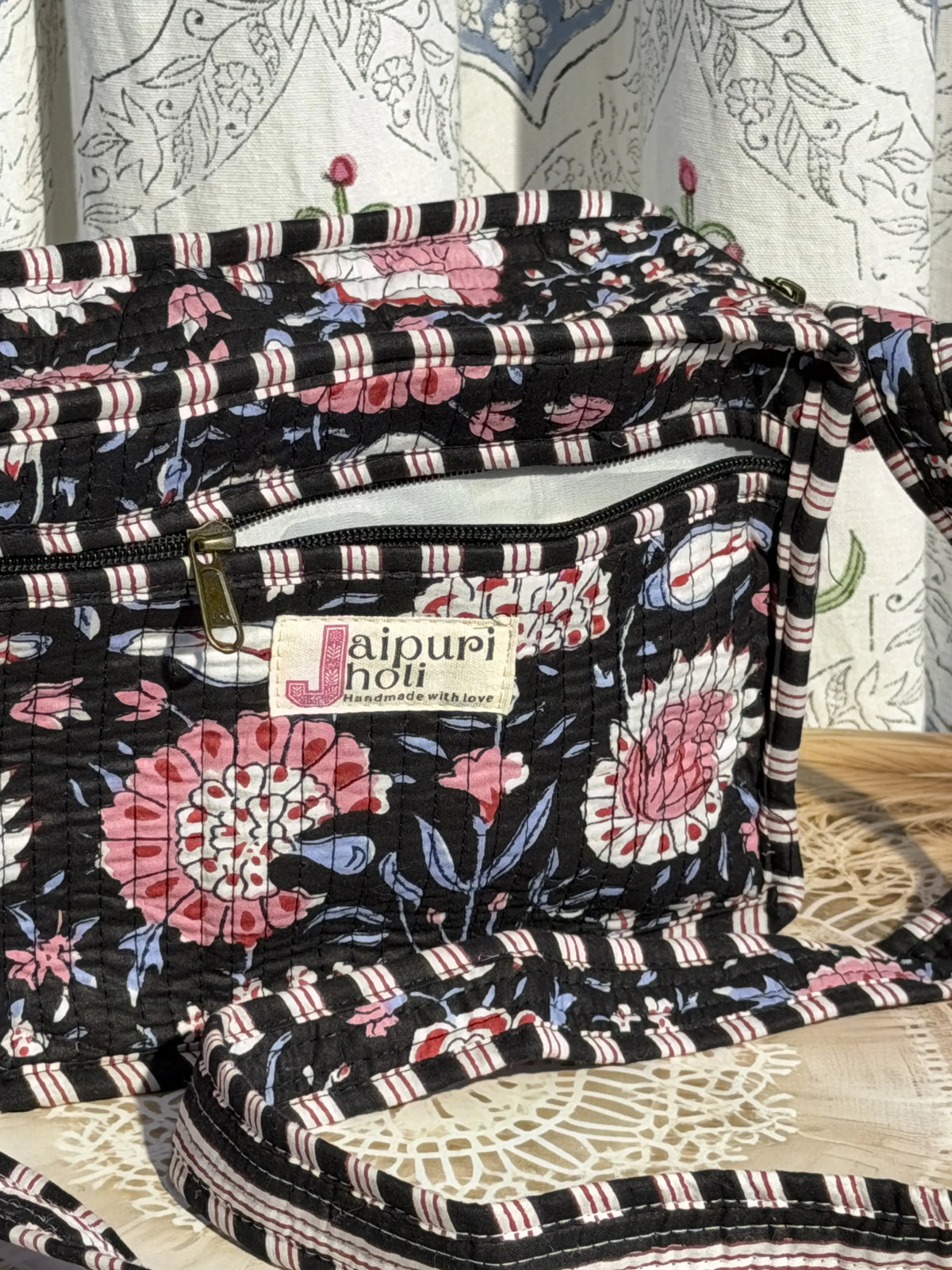 Jaipur Block Print Cotton Quilted Sling Bag - Black and Pink Floral print Close-Up View