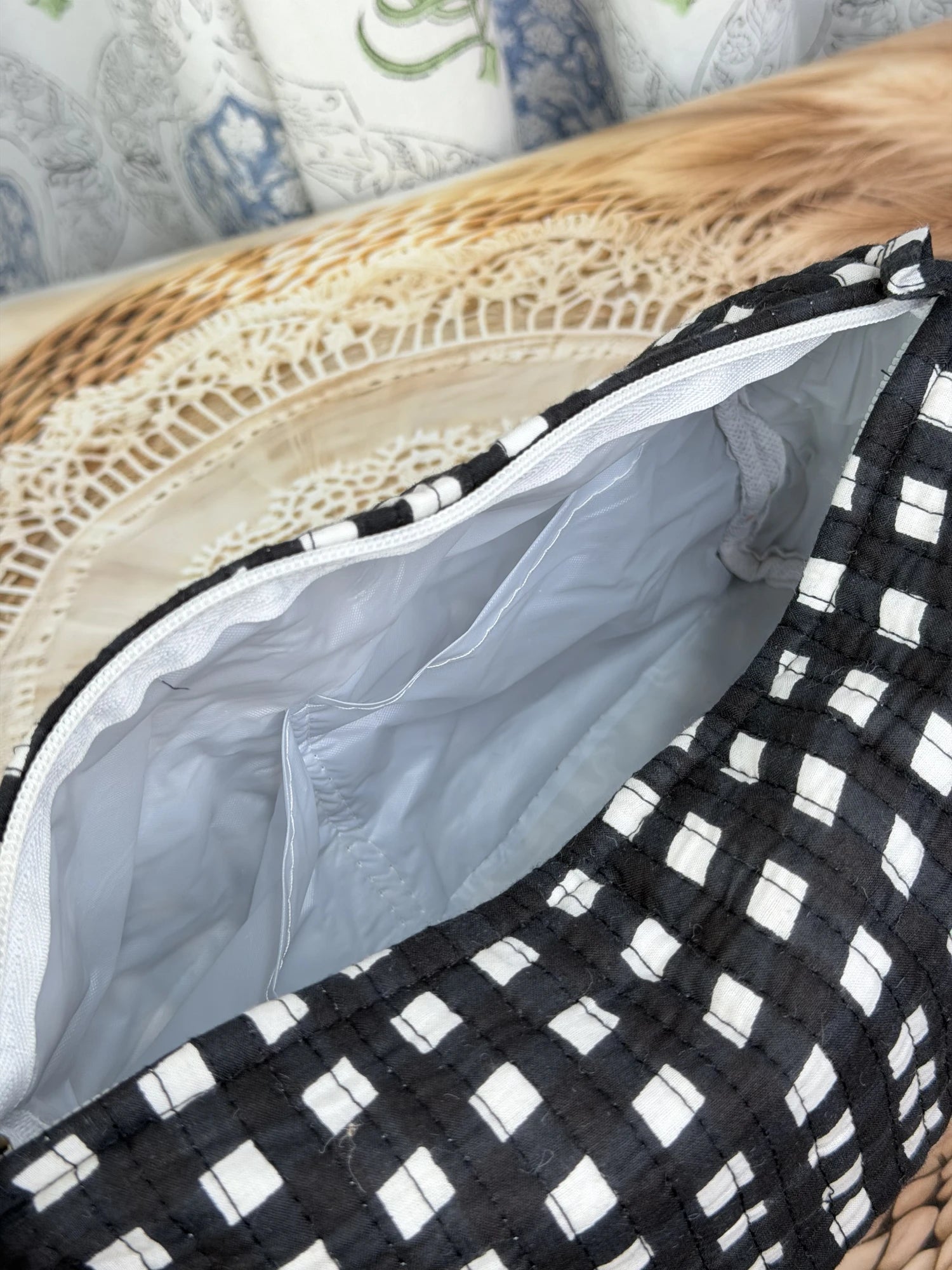 Jaipur Block Print Cotton Quilted Toiletry Pouch in black and white geometric check print, 10 × 6 inch zip pouch for toiletries and travel back view