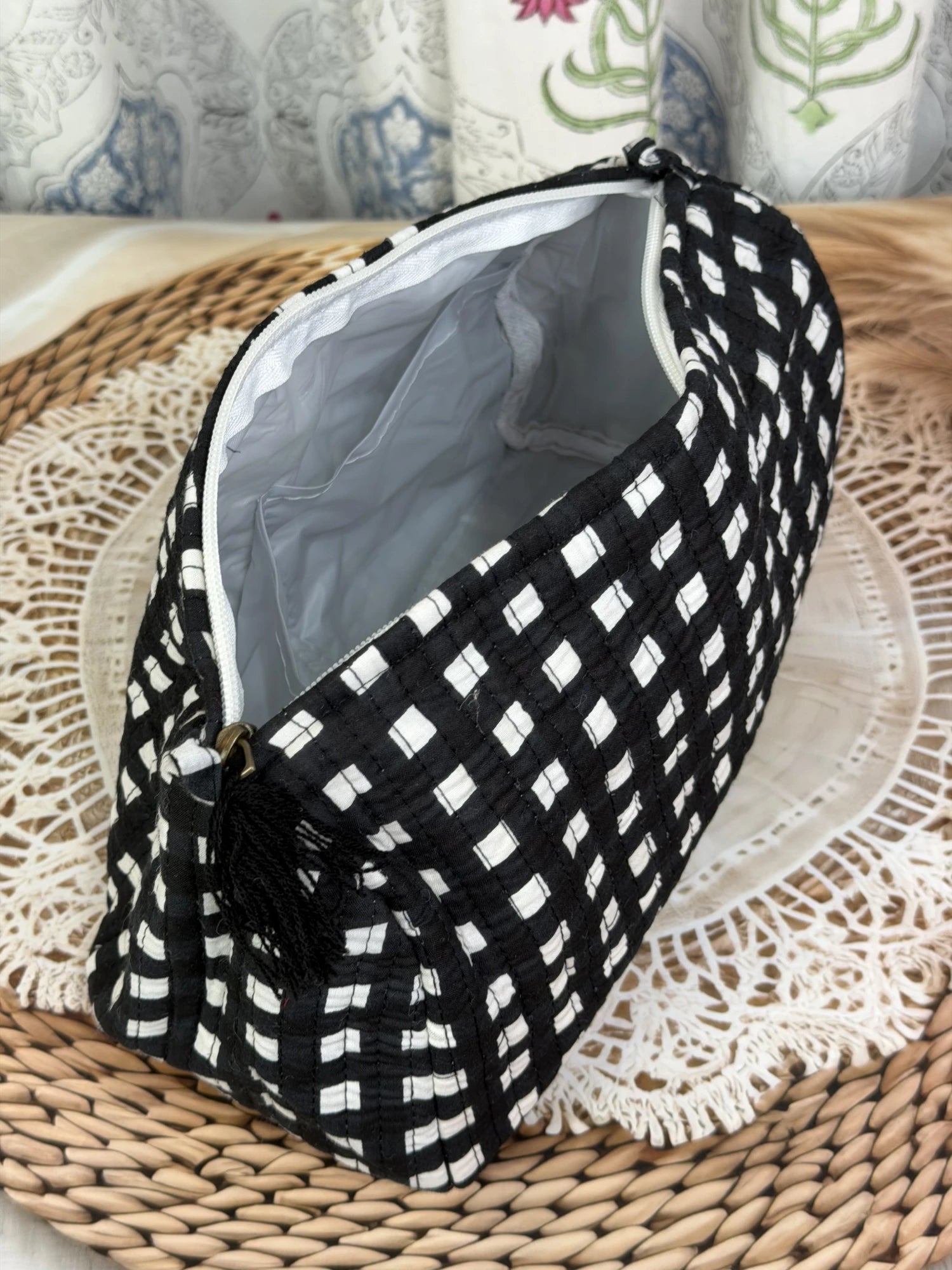 Jaipur Block Print Cotton Quilted Toiletry Pouch in black and white geometric check print, 10 × 6 inch zip pouch for toiletries and travel front view