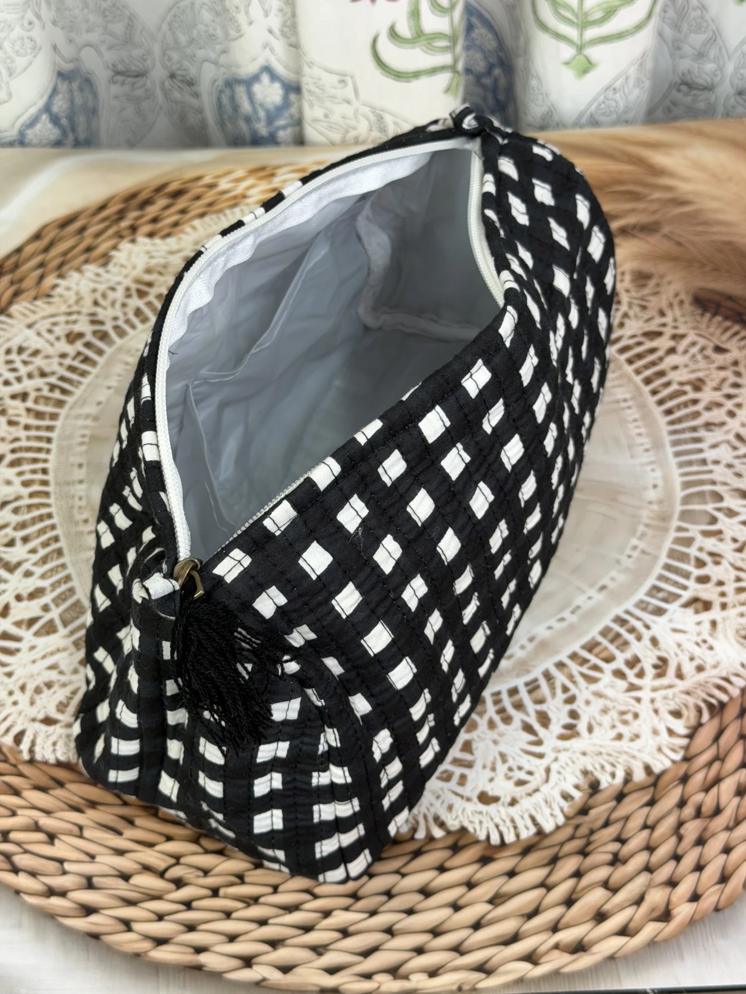 Jaipur Block Print Cotton Quilted Toiletry Pouch in black and white geometric check print, 10 × 6 inch zip pouch for toiletries and travel interior view