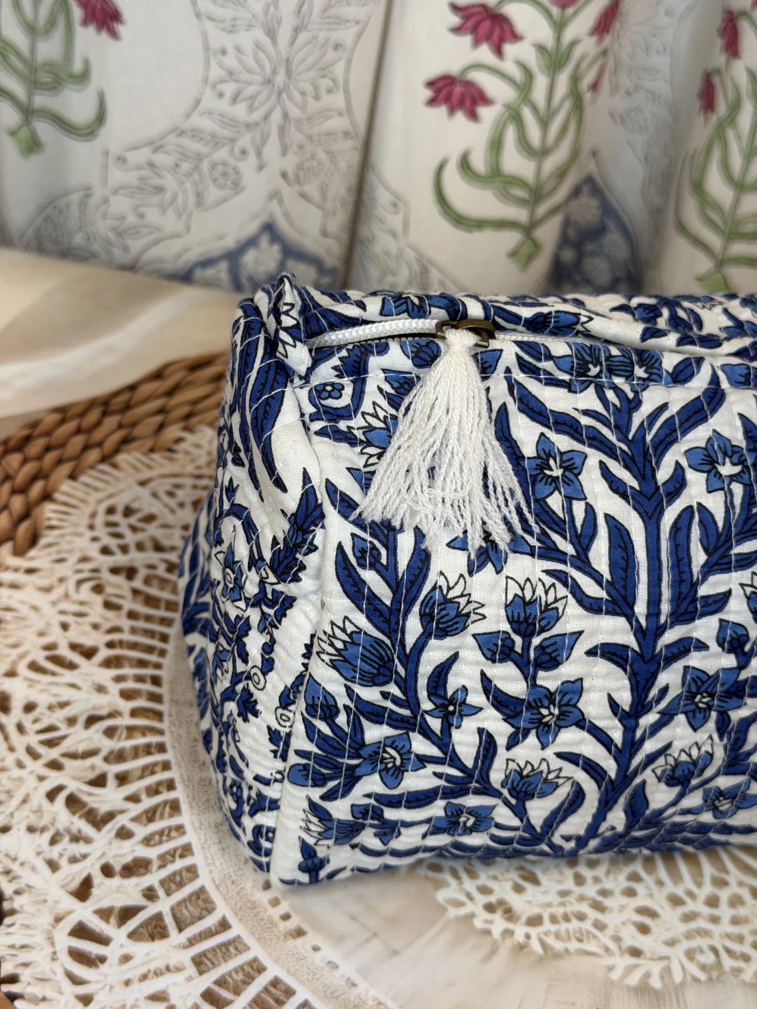Jaipur Block Print Cotton Quilted Cosmetic Pouch in blue floral leaf print, 10 × 6 inch zip pouch for makeup and skincare essentials side view