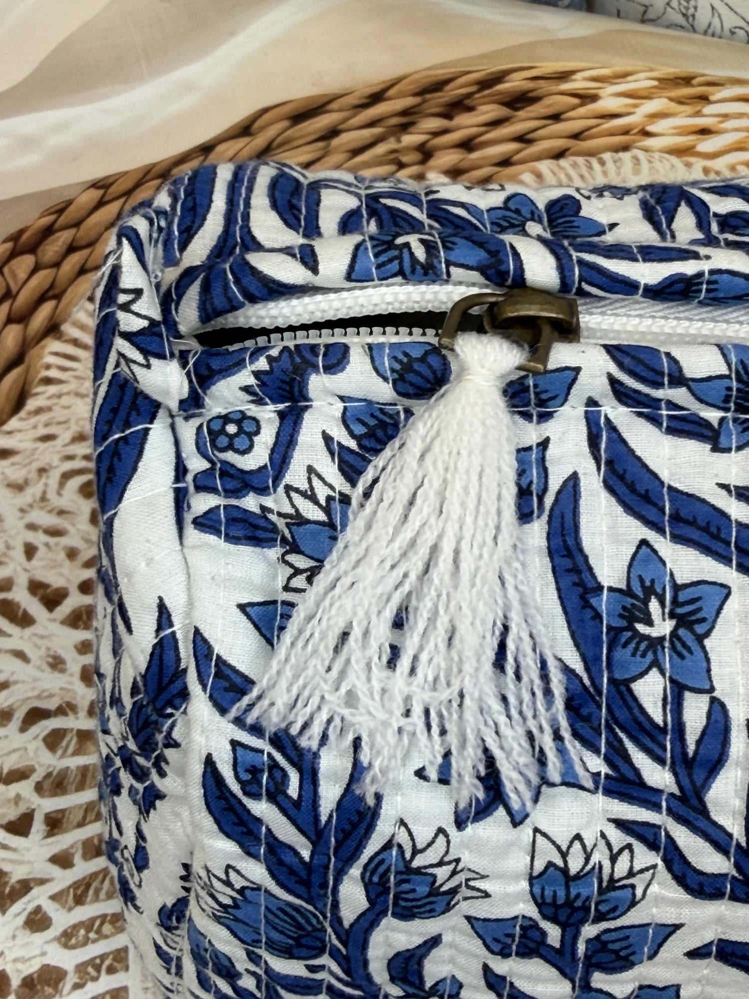 Jaipur Block Print Cotton Quilted Cosmetic Pouch in blue floral leaf print, 10 × 6 inch zip pouch for makeup and skincare essentials back view