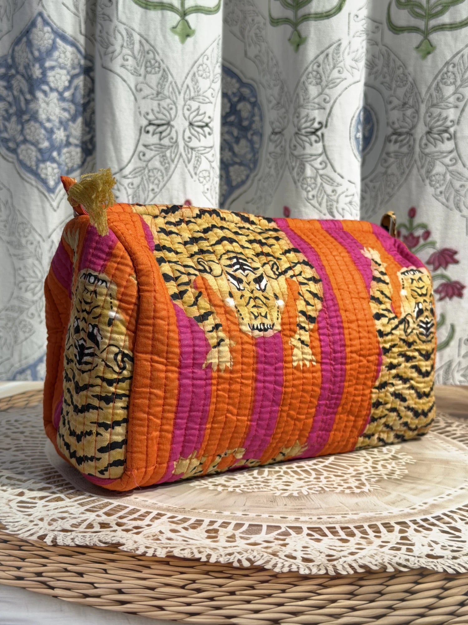 Jaipur Block Print Cotton Quilted Travel Pouch in orange and pink tiger print, 10 × 6 inch zip pouch for travel accessories front view