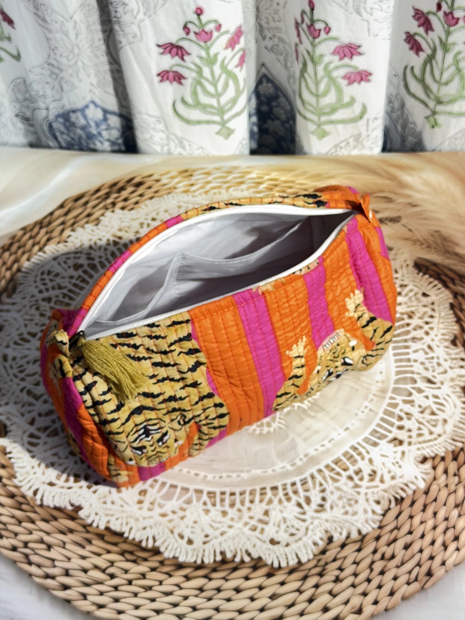 Jaipur Block Print Cotton Quilted Travel Pouch in orange and pink tiger print, 10 × 6 inch zip pouch for travel accessories side view