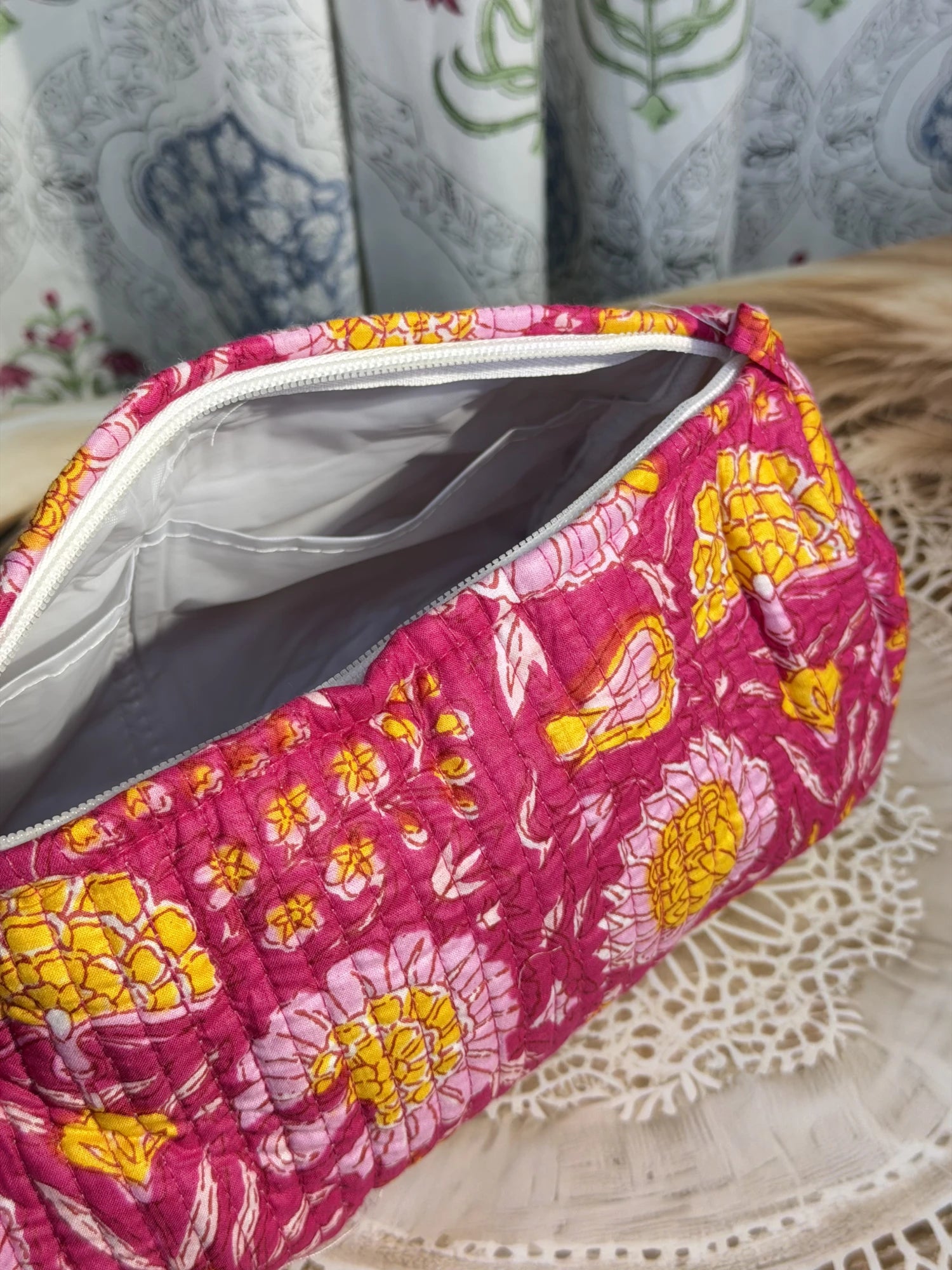 Jaipur Block Print Cotton Quilted Toiletry Pouch in pink floral print, 10 × 6 inch zip pouch for toiletries and personal care items back view