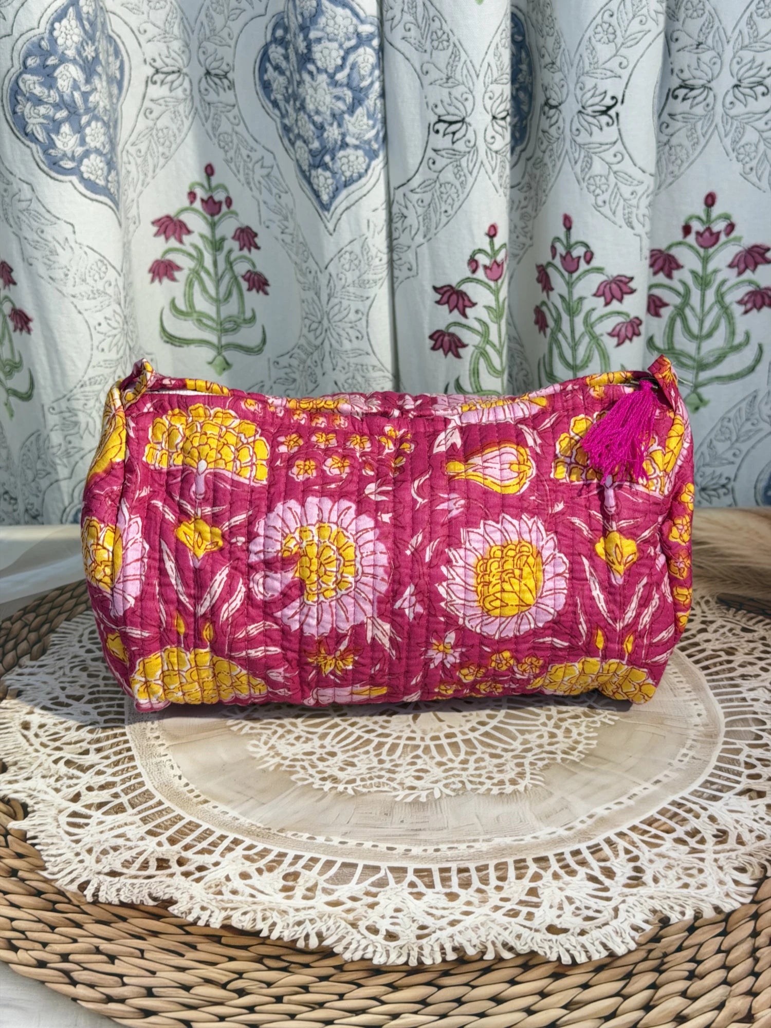 Jaipur Block Print Cotton Quilted Toiletry Pouch in pink floral print, 10 × 6 inch zip pouch for toiletries and personal care items front view
