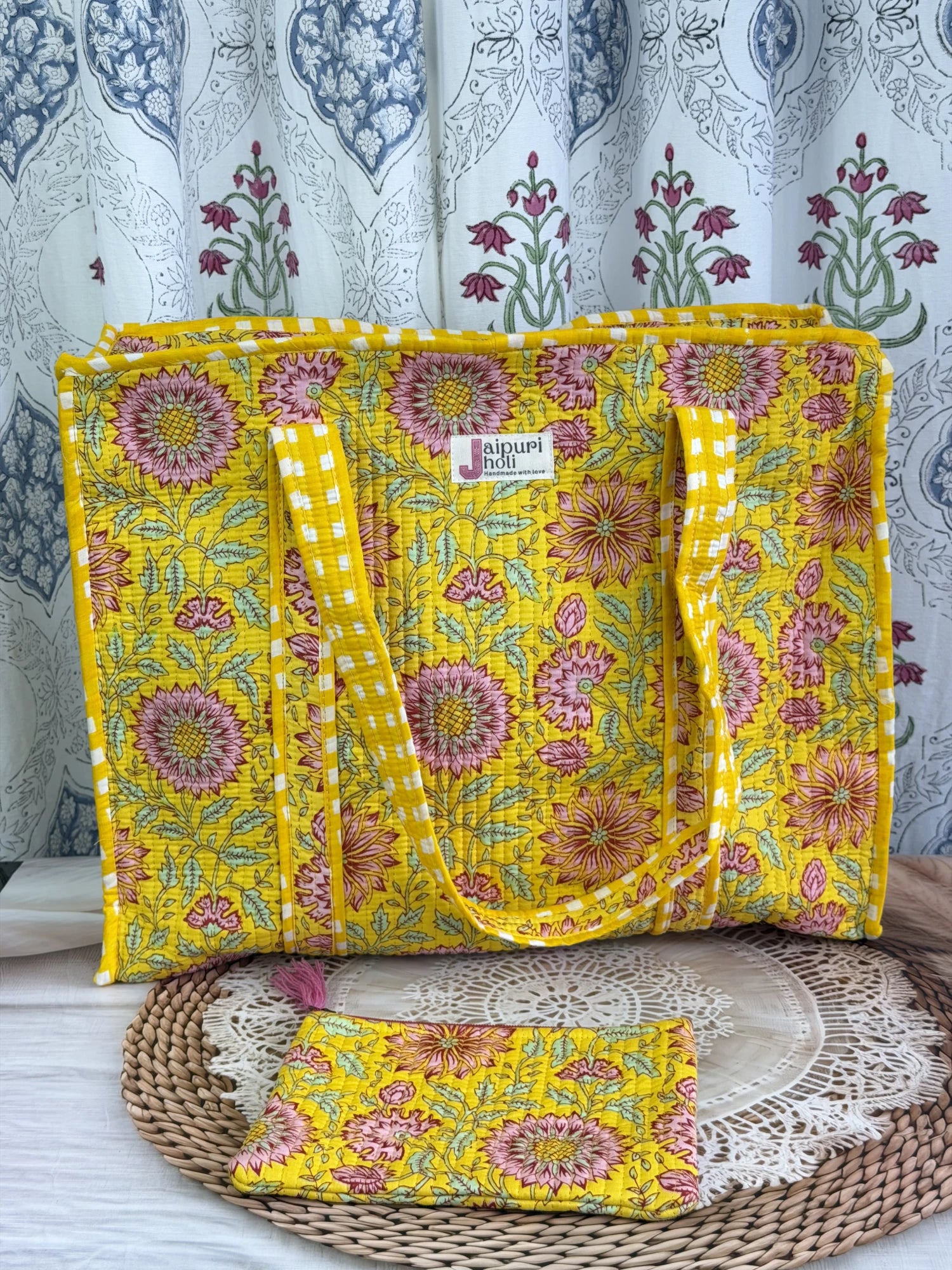 Jaipur block print cotton quilted large tote bag with matching flat pouch, red floral print, 18×18×6 inch tote with 9×7 inch flat pouch for cosmetics, stationery and small essentials side view