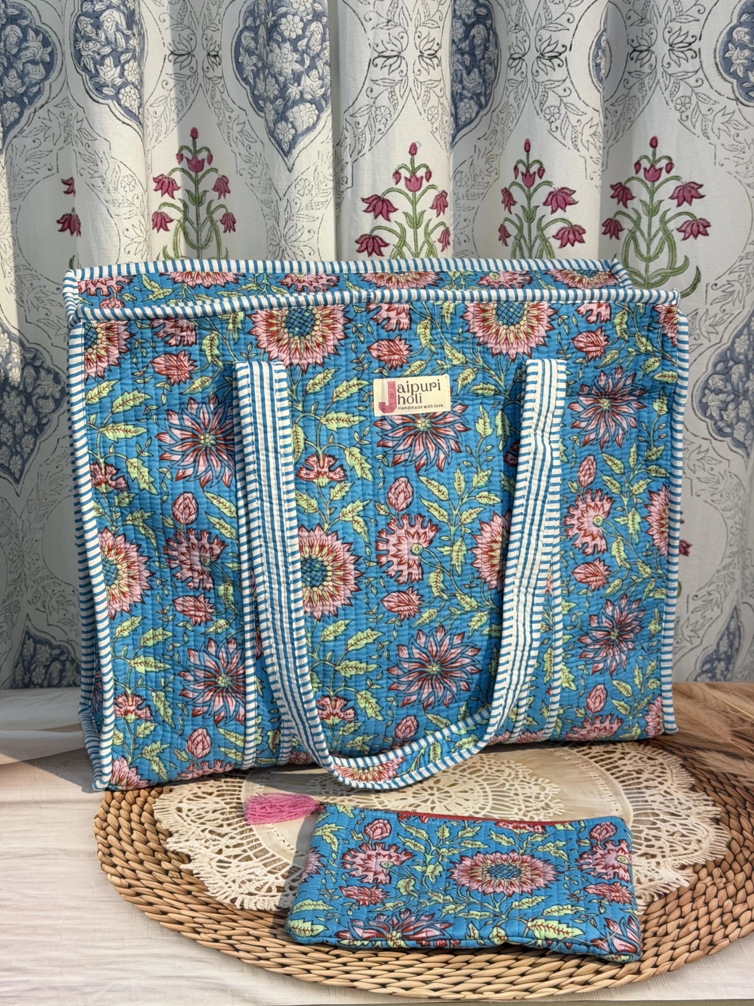 Jaipur block print cotton quilted large tote bag with matching flat pouch, blue floral print, 18×18×6 inch tote with 9×7 inch flat pouch for documents, cosmetics and travel essentials side view