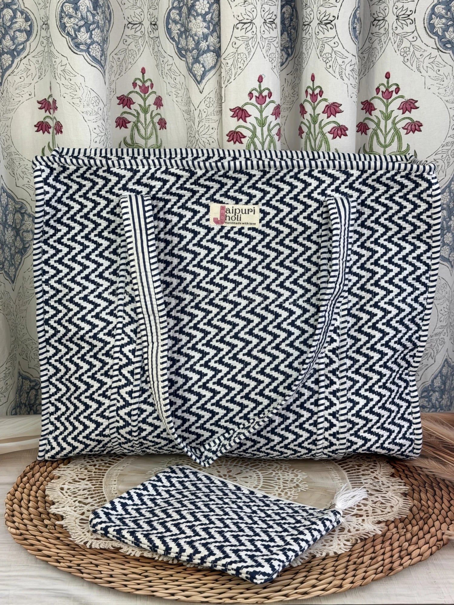 Jaipur block print cotton quilted large tote bag with matching flat pouch, blue and white geometric zigzag print, 18×18×6 inch tote with 9×7 inch flat pouch for documents, chargers and travel essentials back view