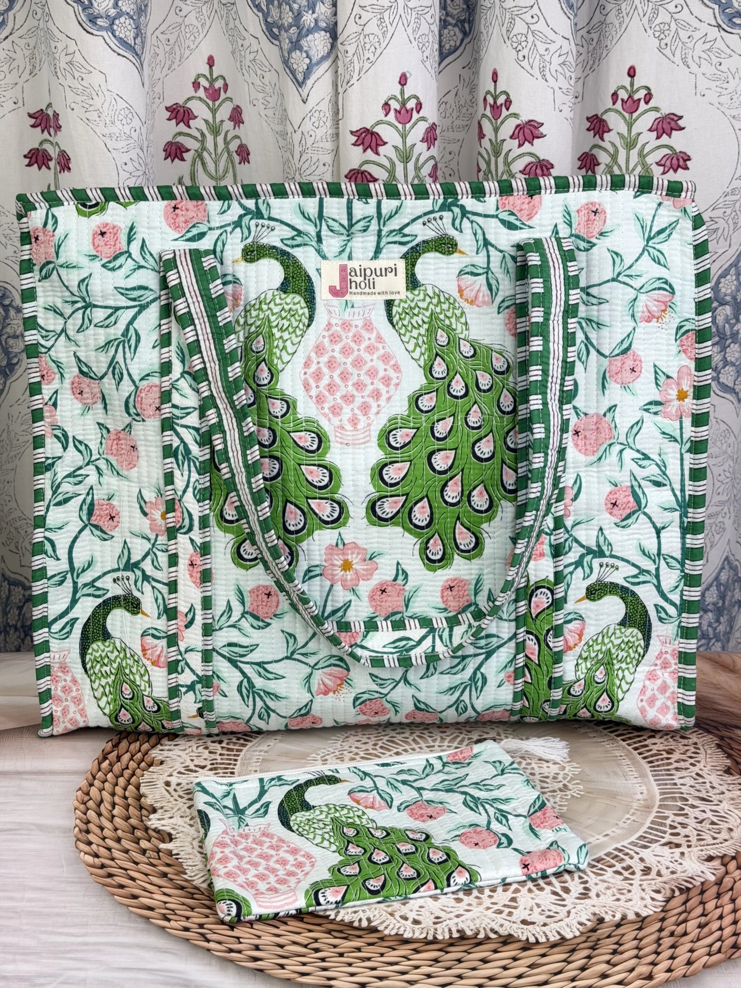 Jaipur block print cotton quilted large tote bag with matching flat pouch, green and pink peacock print, 18×18×6 inch tote with 9×7 inch flat pouch for documents, cosmetics and everyday essentials front view