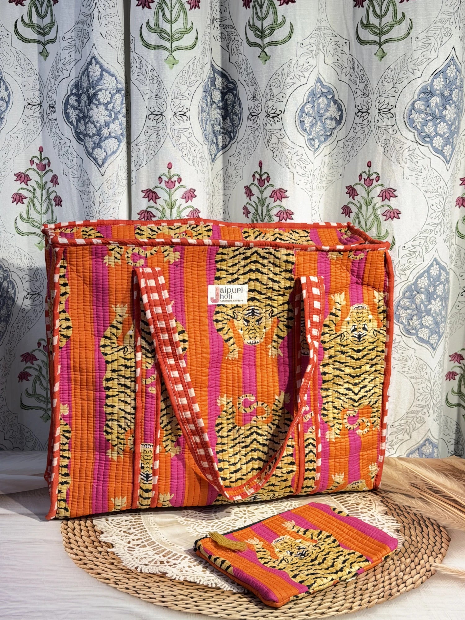 Jaipur block print cotton quilted large tote bag with matching flat pouch, orange and pink tiger animal print, 18×18×6 inch tote with 9×7 inch flat pouch for stationery, chargers and travel essentials side view