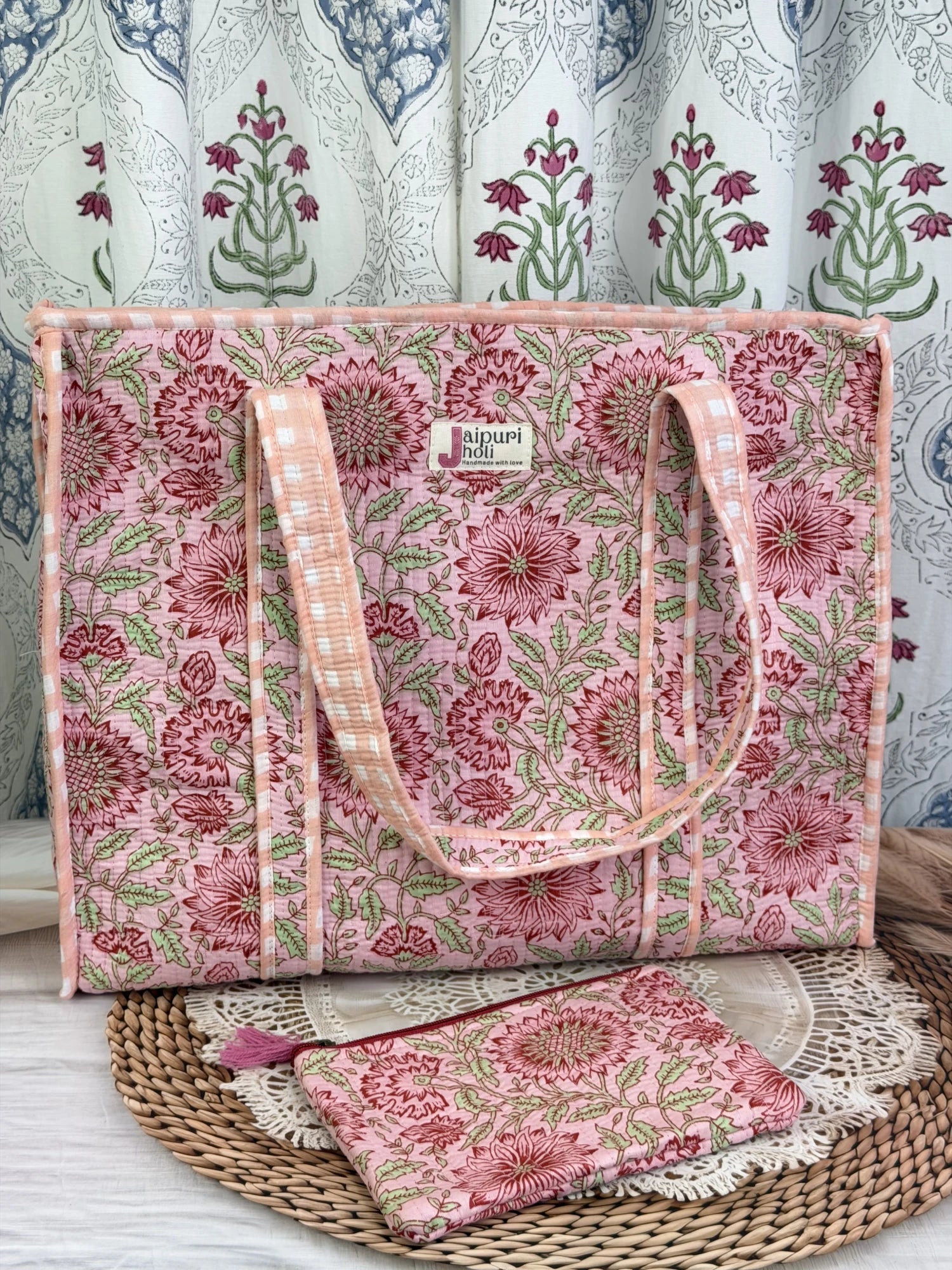 Jaipur block print cotton quilted large tote bag with matching flat pouch, peach and pink floral print, 18×18×6 inch tote with 9×7 inch flat pouch for cosmetics, documents and small essentials side view