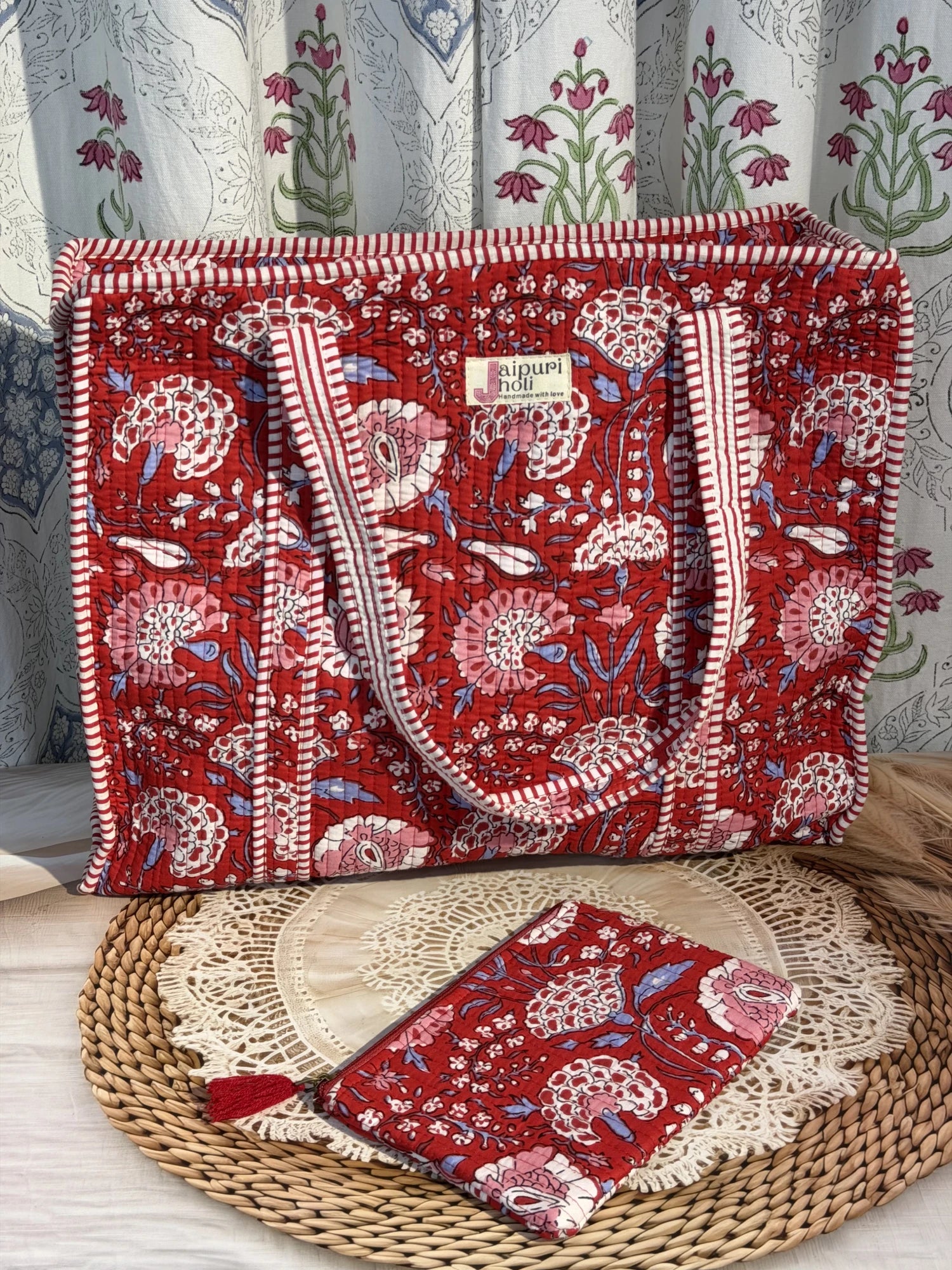Jaipur block print cotton quilted large tote bag with matching flat pouch, red floral print, 18×18×6 inch tote with 9×7 inch flat pouch for cosmetics, stationery and small essentials close-up view