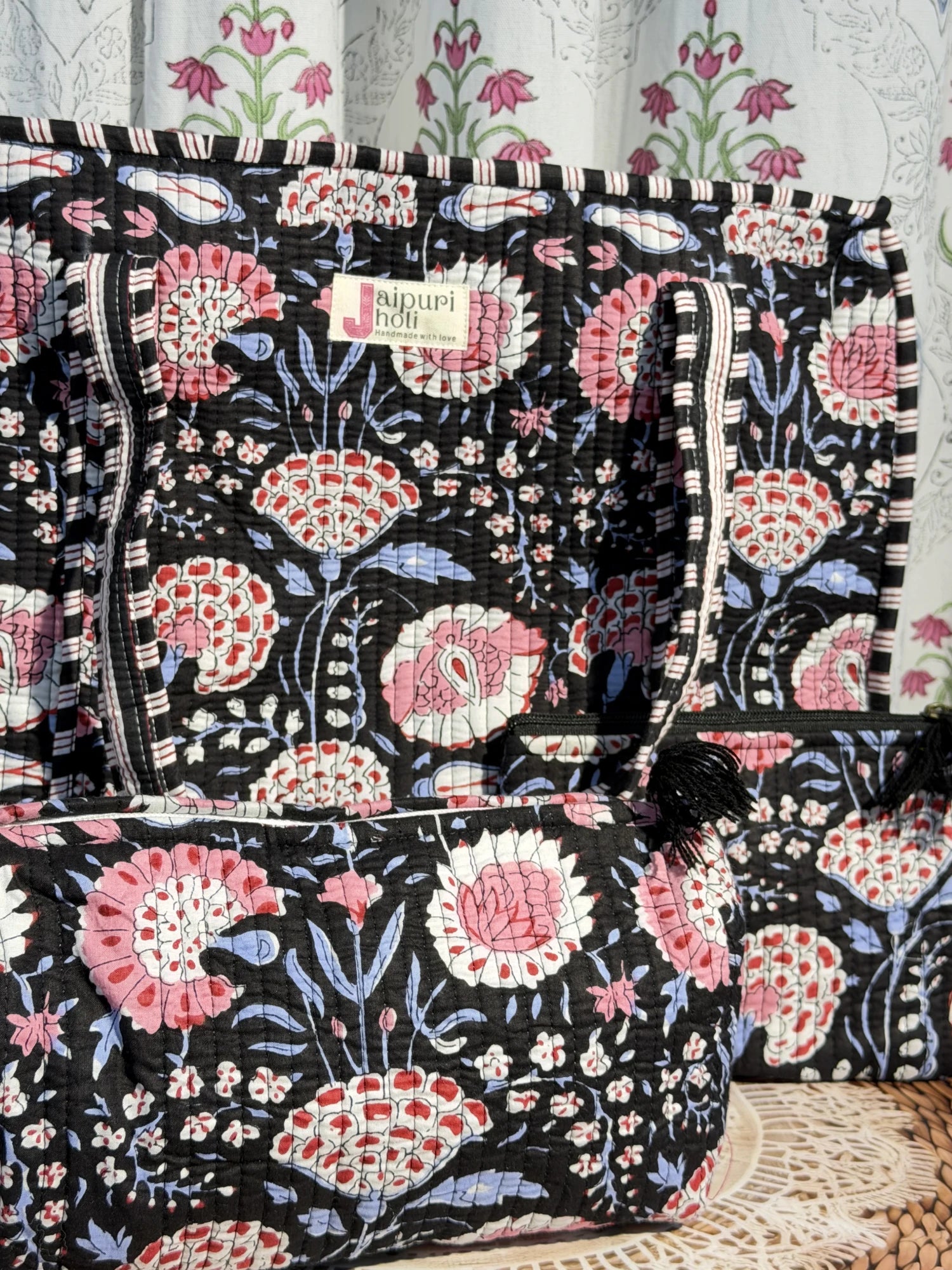 Jaipur block print cotton quilted large zip tote bag with matching toiletry pouch and flat pouch, black and pink floral print, 18 × 18 × 6 inch tote, 10 × 6 inch toiletry pouch and 9 × 7 inch flat pouch interior view