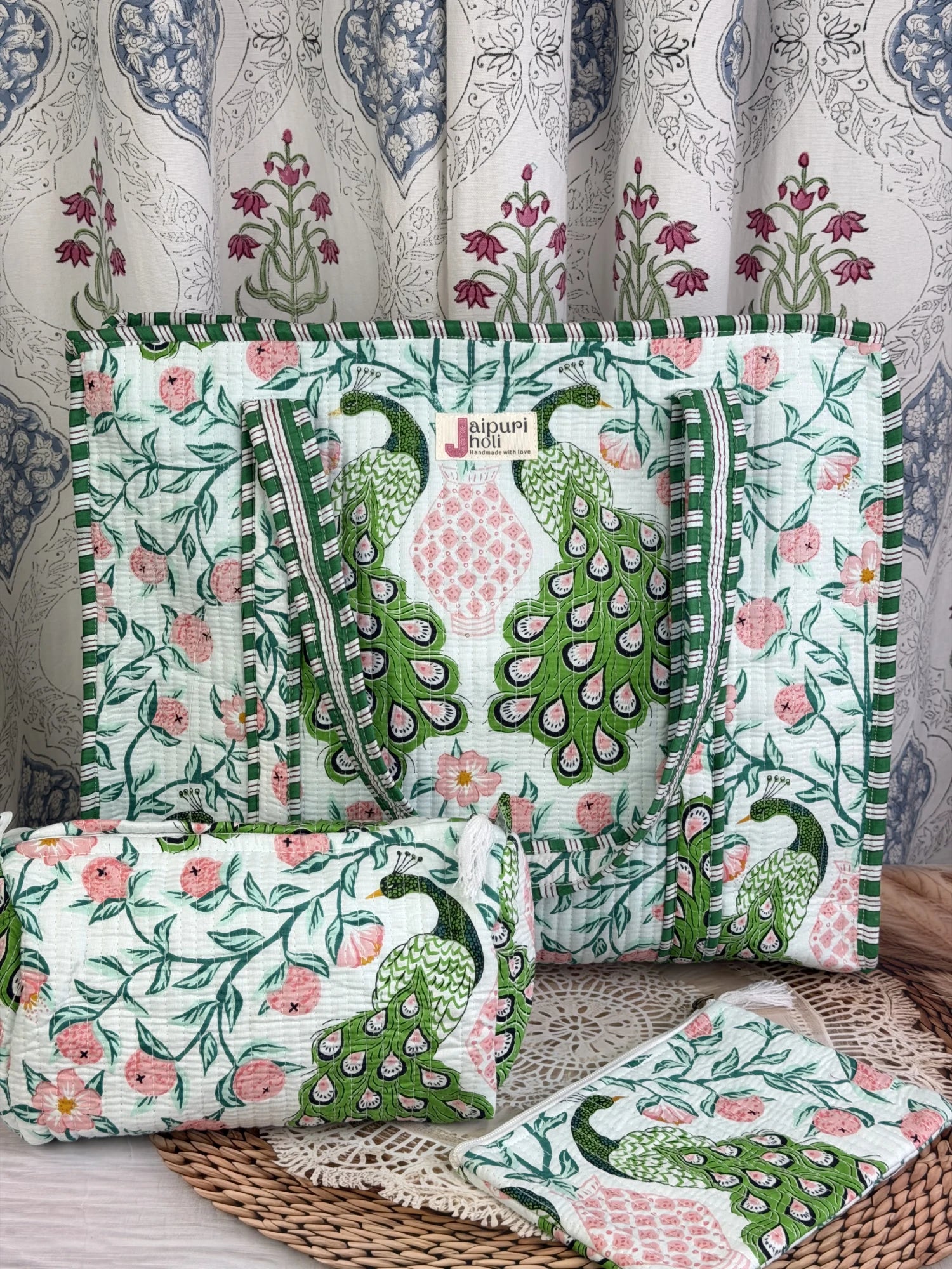 Jaipur block print cotton quilted large zip tote bag with matching toiletry pouch and flat pouch, green and pink peacock print, 18 × 18 × 6 inch tote, 10 × 6 inch toiletry pouch and 9 × 7 inch flat pouch back view