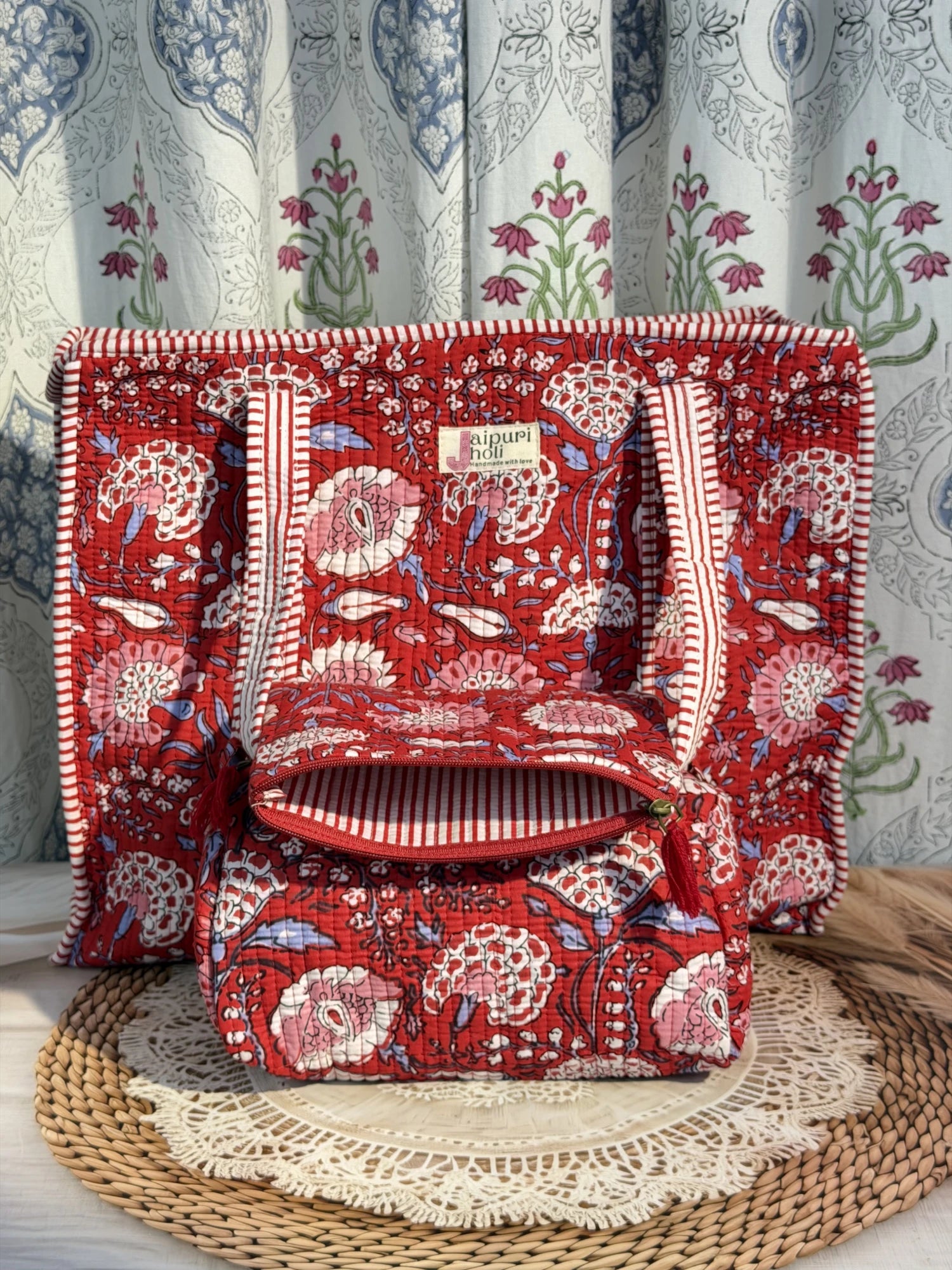 Jaipur block print cotton quilted large zip tote bag with matching toiletry pouch and flat pouch, red floral print, 18 × 18 × 6 inch tote, 10 × 6 inch toiletry pouch and 9 × 7 inch flat pouch back view
