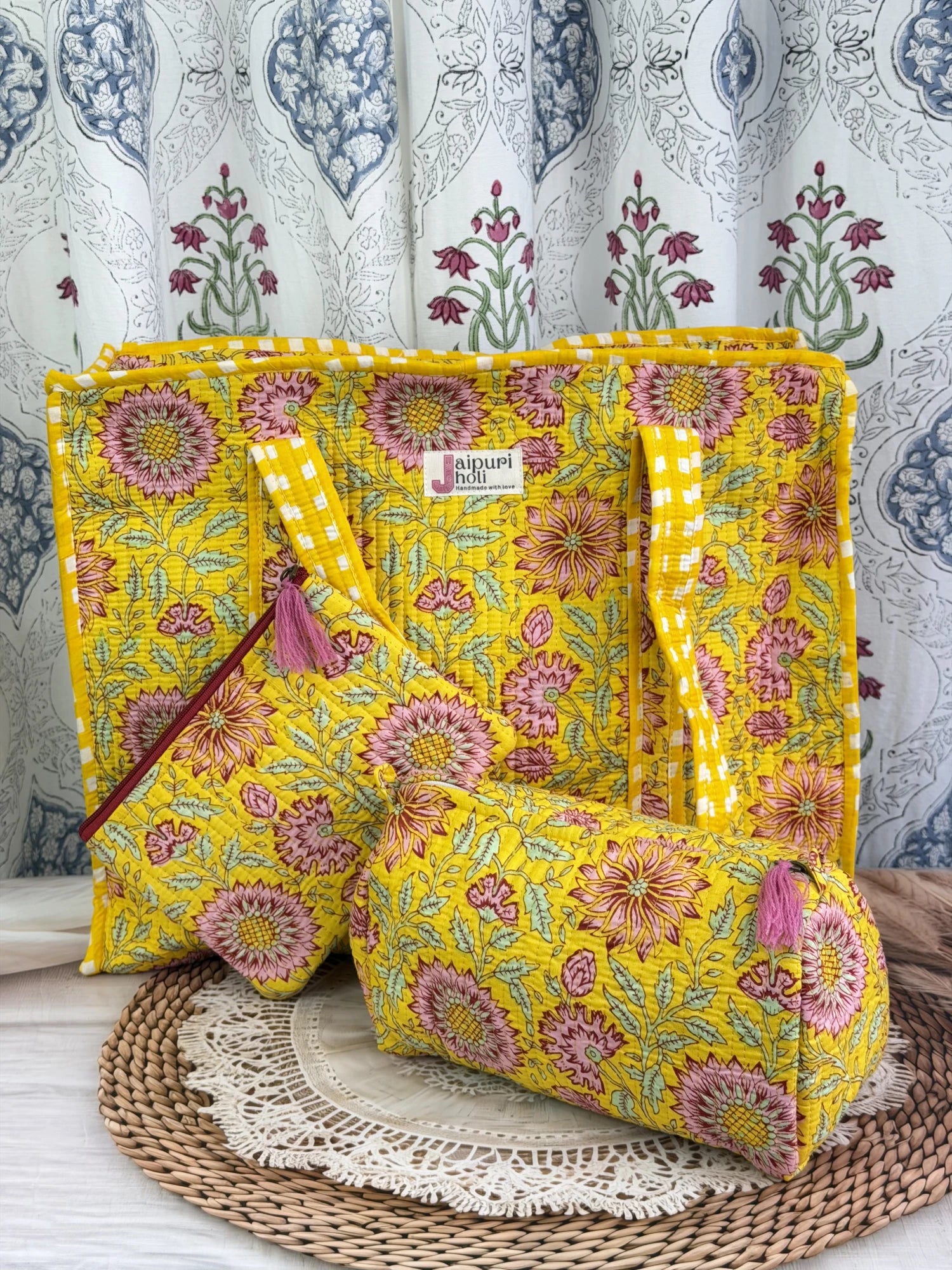Jaipur block print cotton quilted large zip tote bag with matching toiletry pouch and flat pouch, yellow-floral print, 18 × 18 × 6 inch tote, 10 × 6 inch toiletry pouch and 9 × 7 inch flat pouch side view