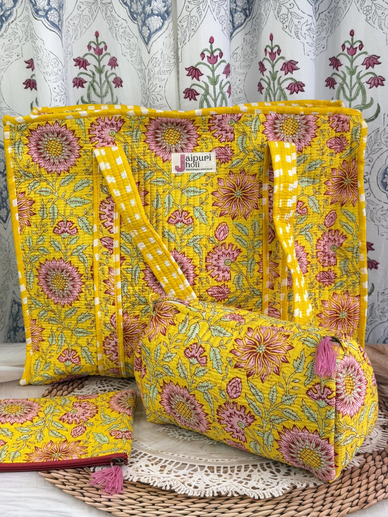 Jaipur block print cotton quilted large zip tote bag with matching toiletry pouch and flat pouch, yellow-floral print, 18 × 18 × 6 inch tote, 10 × 6 inch toiletry pouch and 9 × 7 inch flat pouch back view
