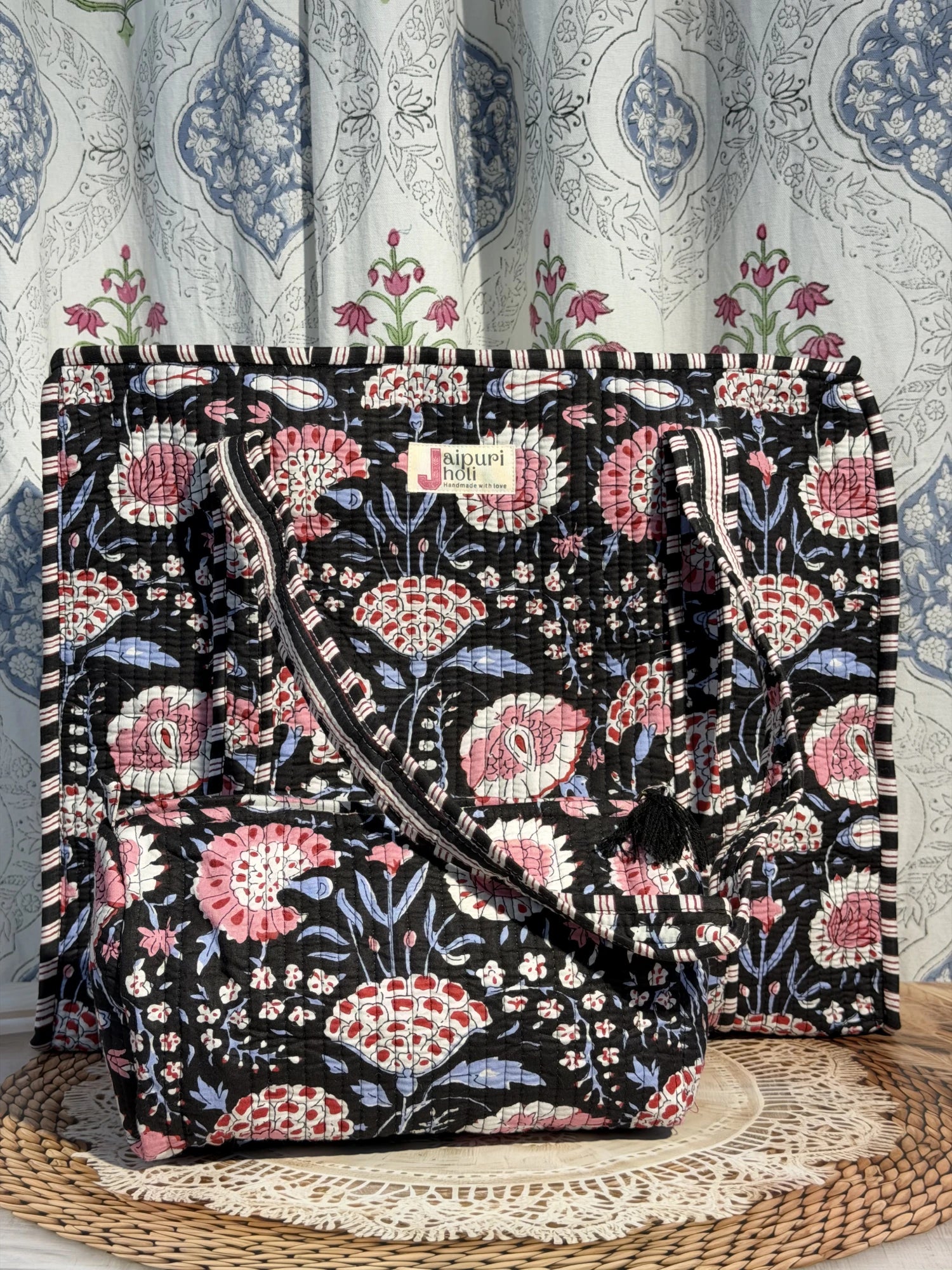 Jaipur block print cotton quilted large tote bag with matching pouch, black and pink floral print, 18x18x6 inch tote with 10x6 inch pouch for organizing cosmetics, toiletries and small travel items. Front View