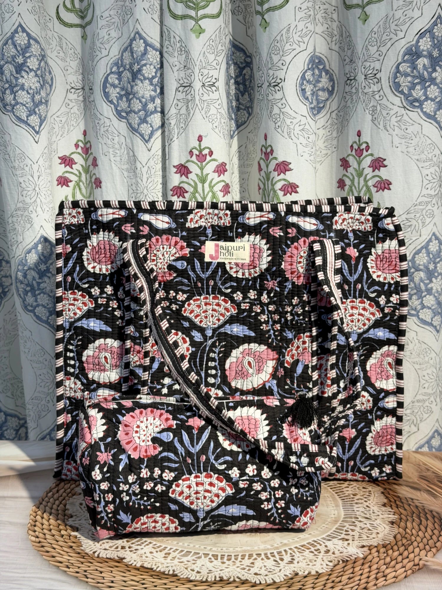 Jaipur block print cotton quilted large tote bag with matching pouch, black and pink floral print, 18x18x6 inch tote with 10x6 inch pouch for organizing cosmetics, toiletries and small travel items. Back View
