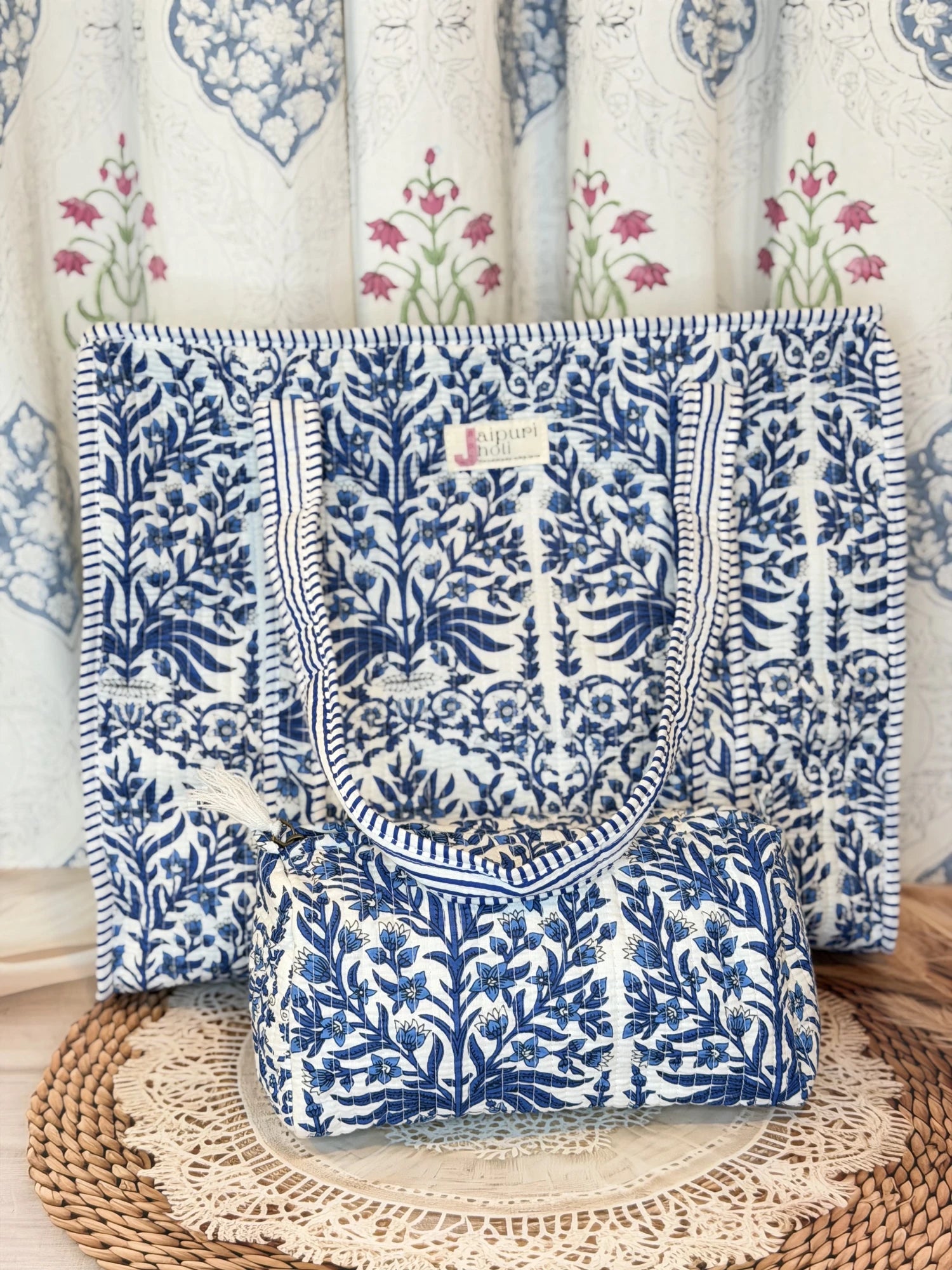 Jaipur block print cotton quilted large tote bag with matching pouch, blue floral and leaf print, 18x18x6 inch tote with 10x6 inch pouch for keeping cosmetics, medicines and toiletries organized back view